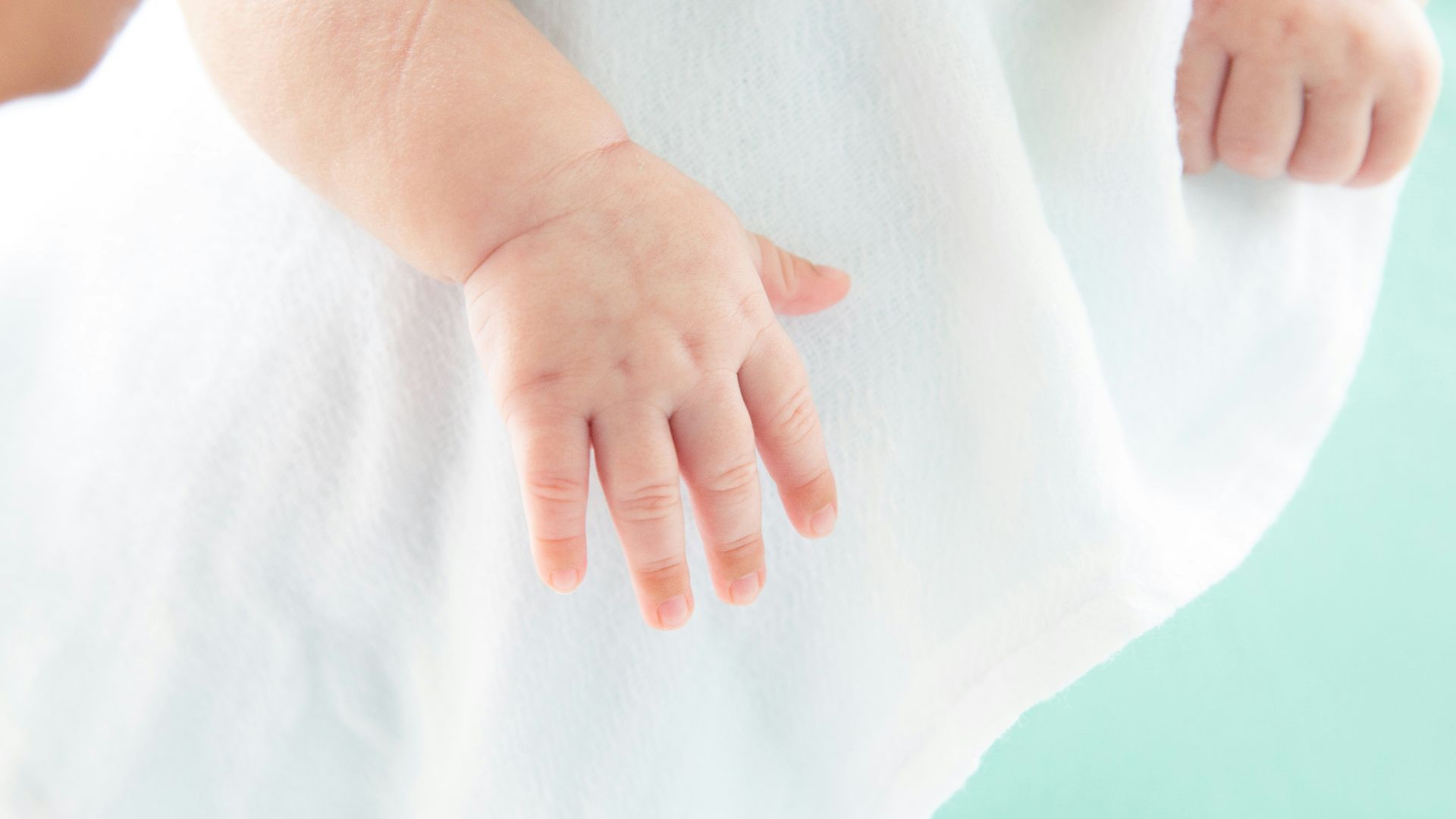 a close-up of a person holding the belly