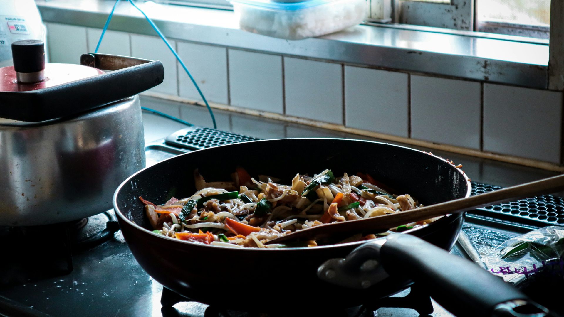 black cooking pan with food
