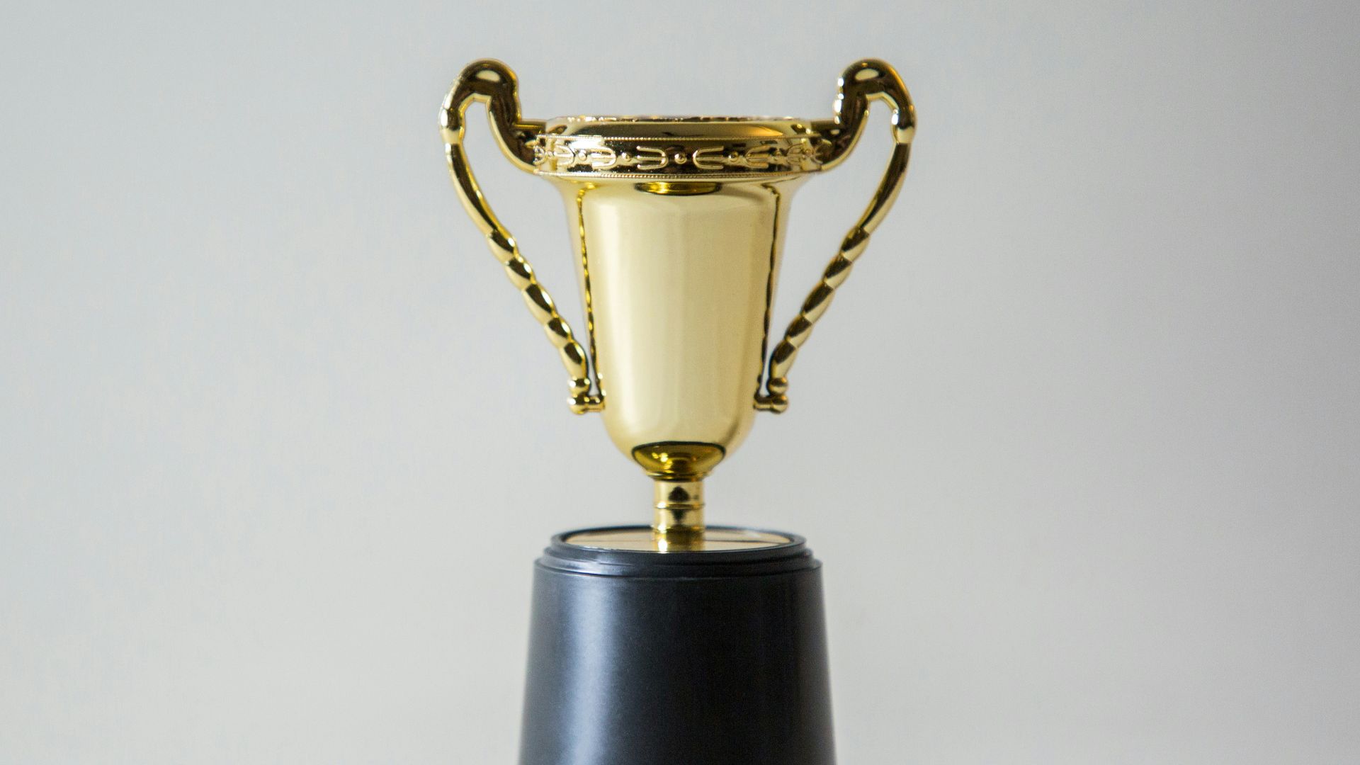 yellow and white trophy