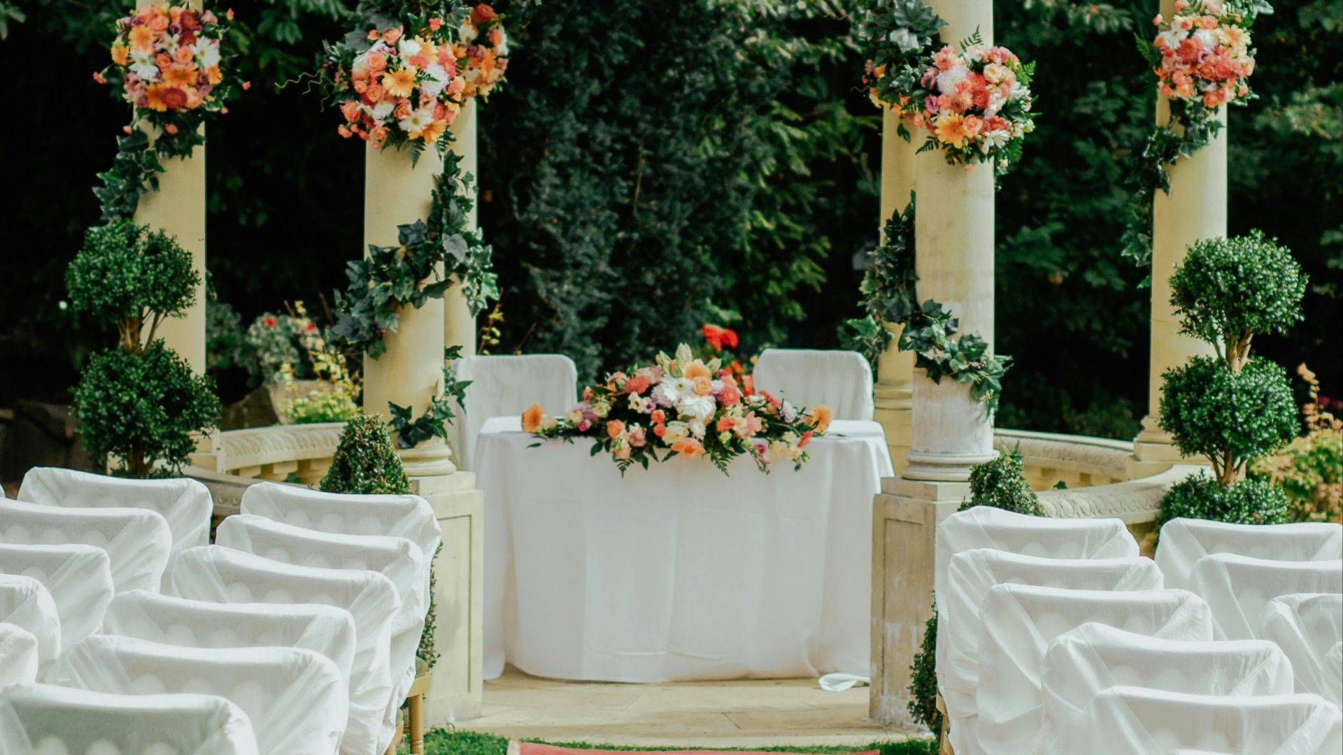 gray and beige gazebo near green leafed tree