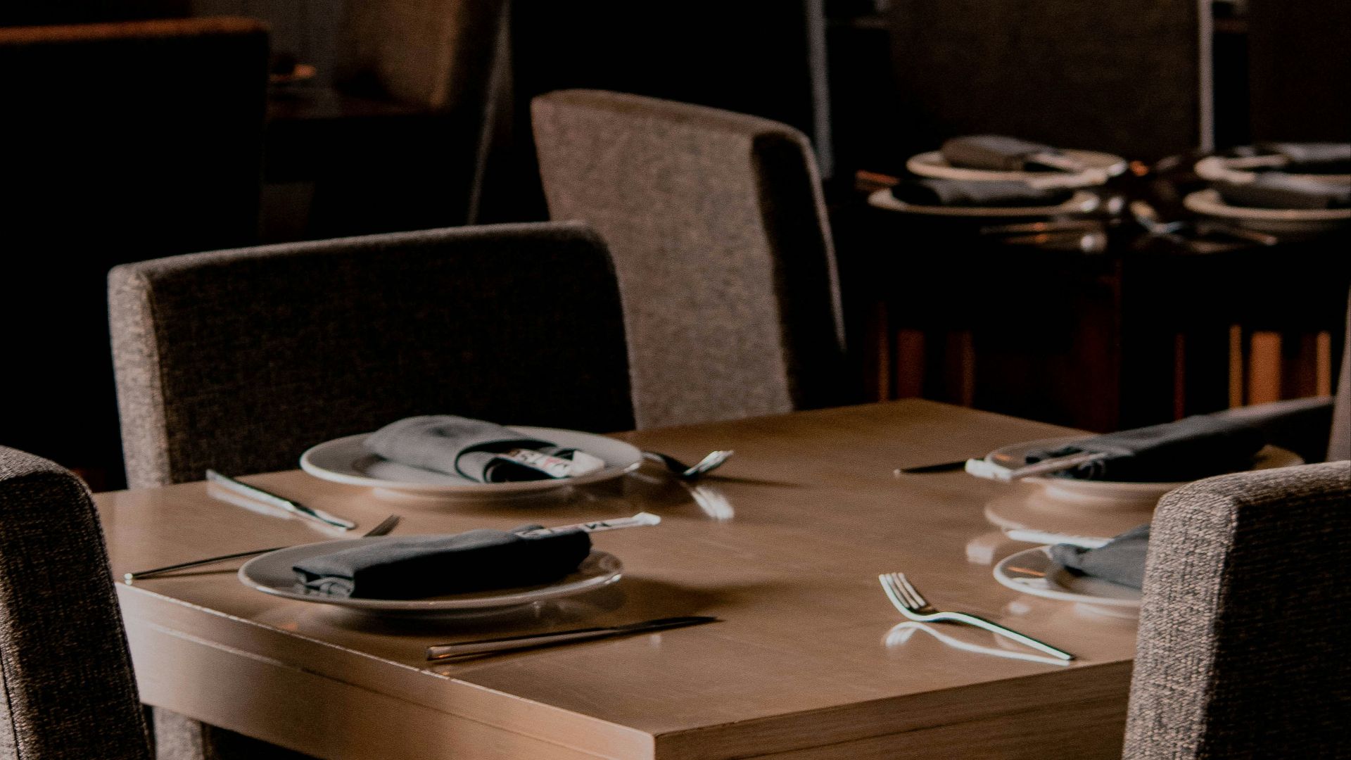 square brown wooden dining table