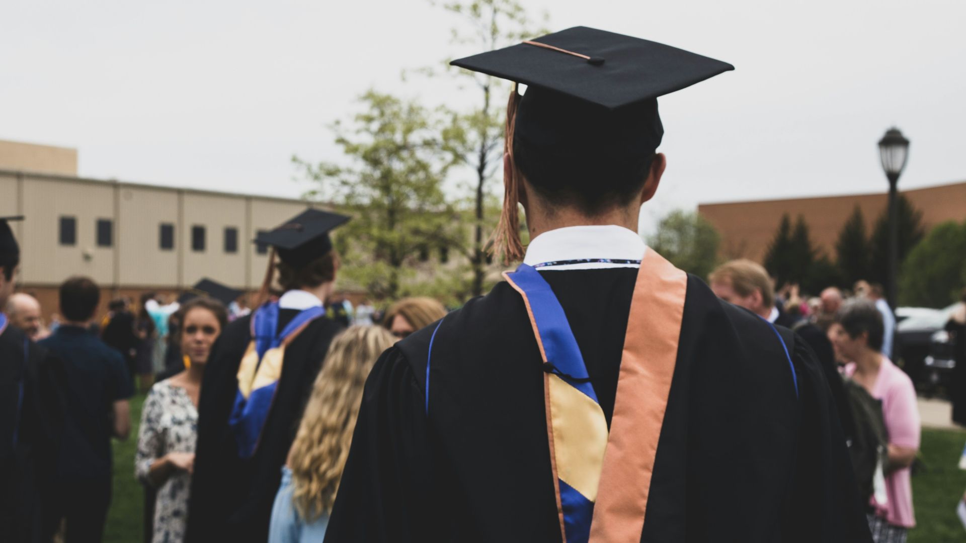 man wearing academic gown