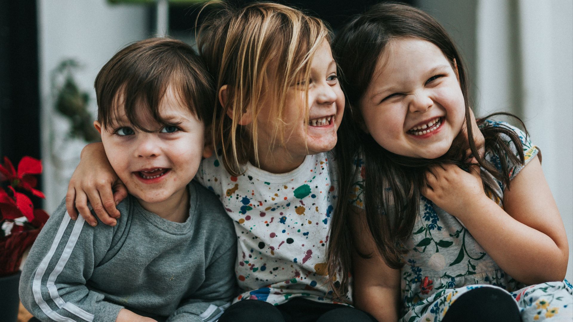2 girls sitting on floor