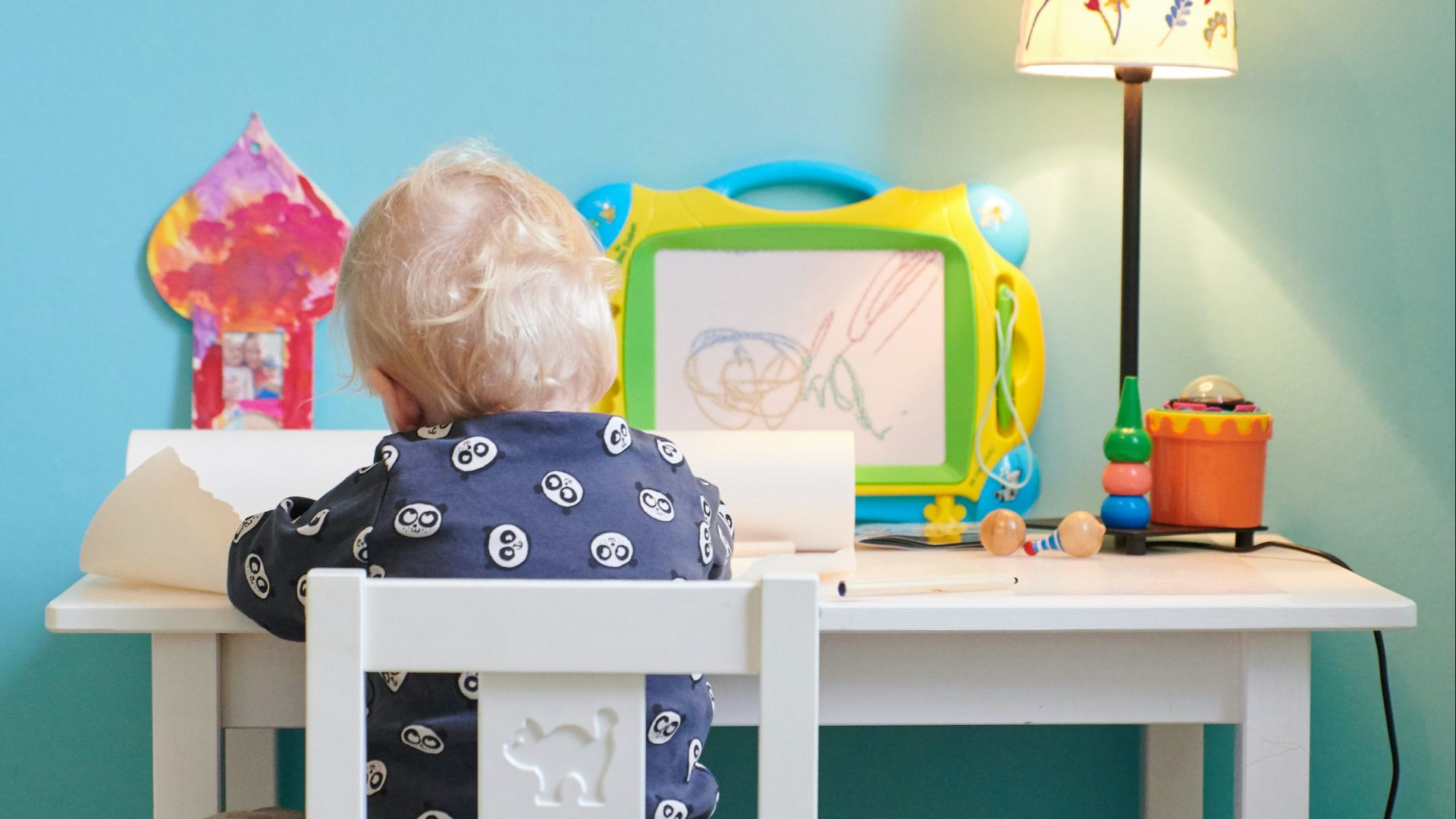 white and black wooden table with white and blue table lamp