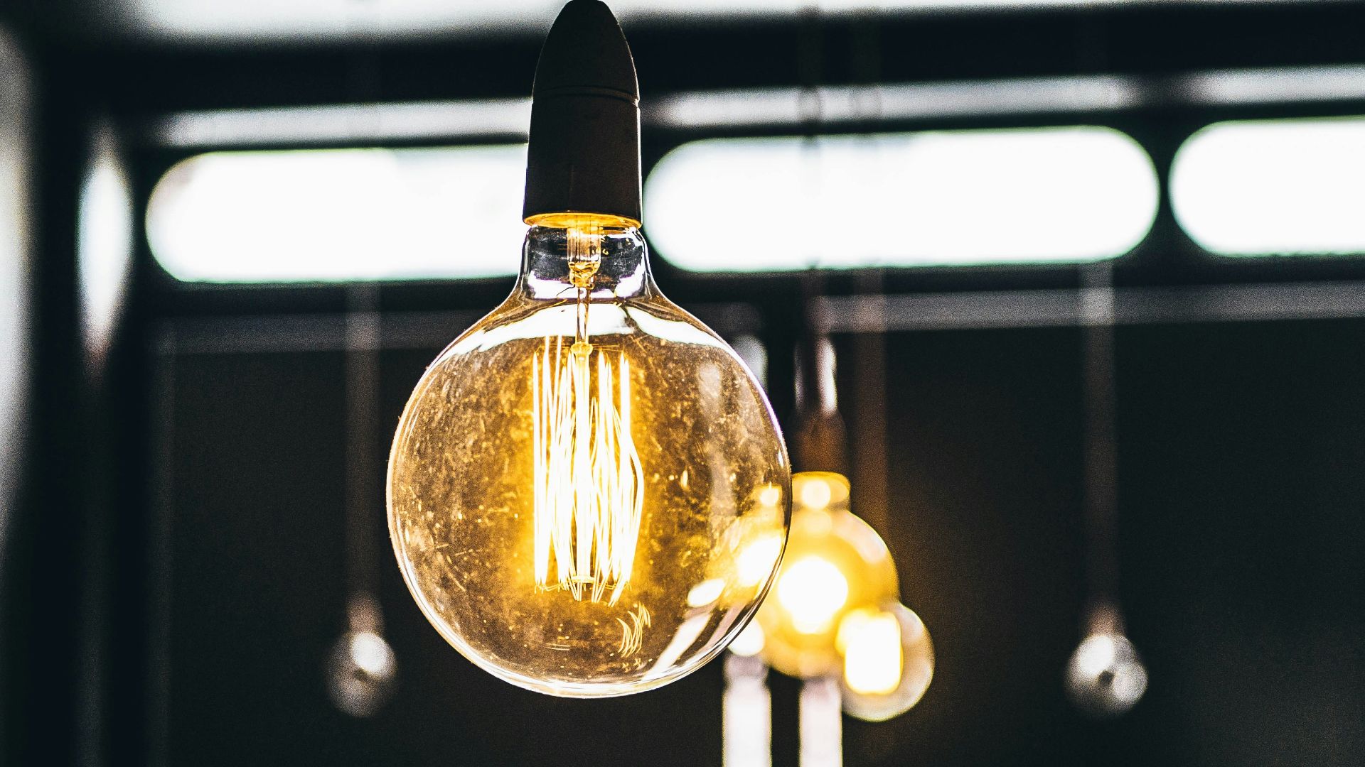 tilt shift lens photography of clear glass bulb