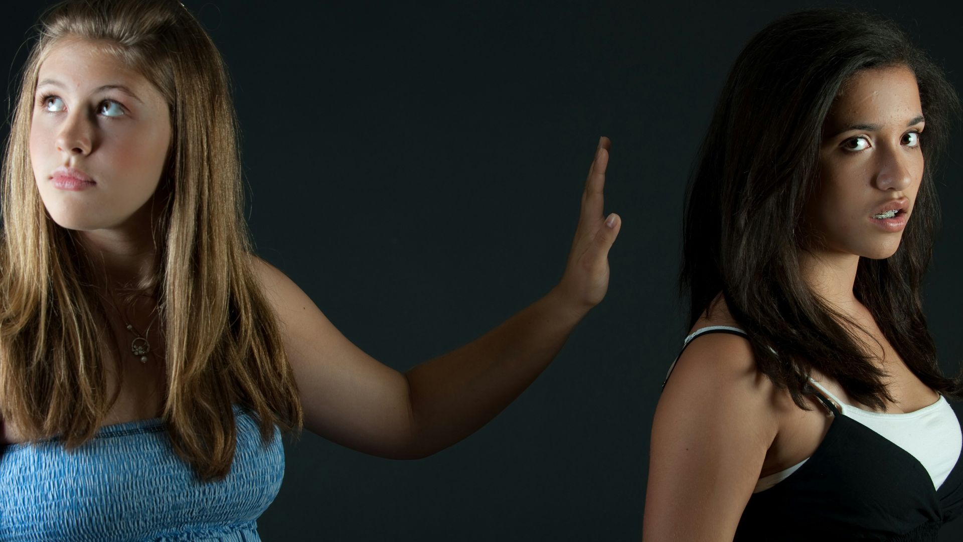 girl in blue sleeveless dress