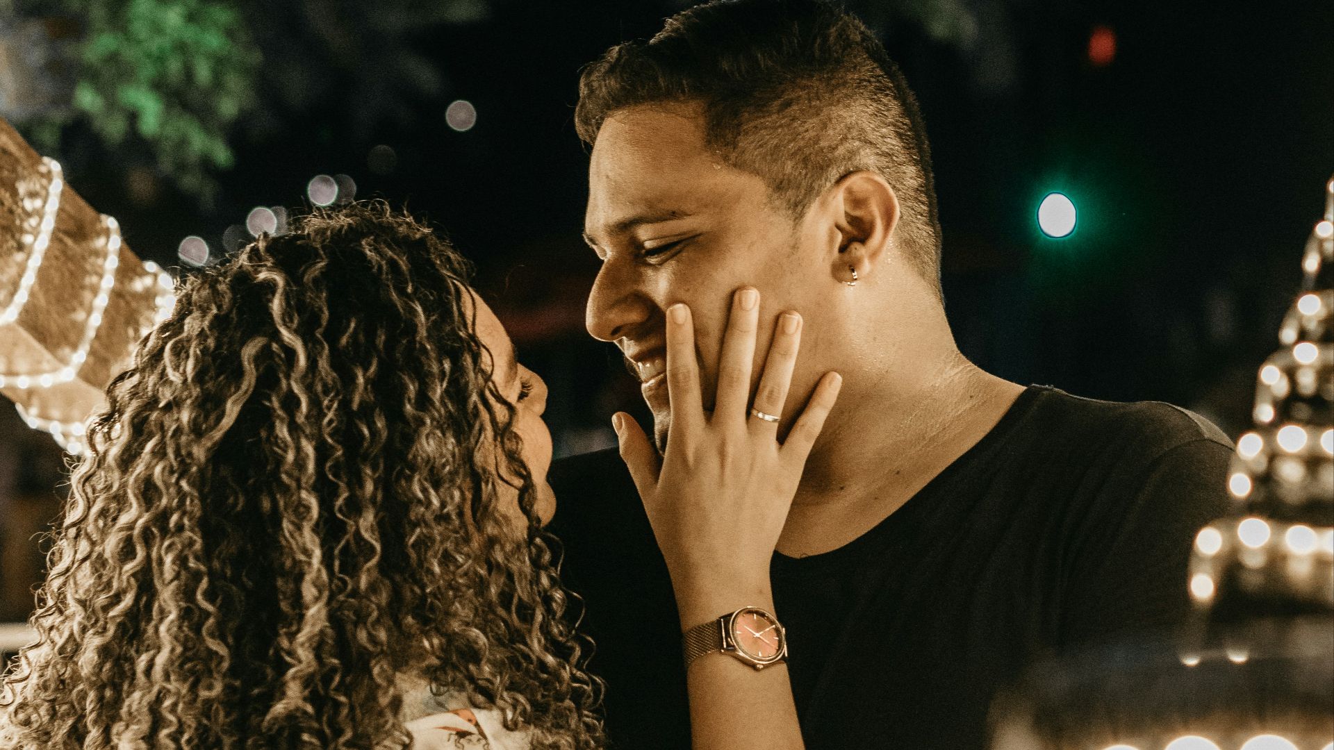 a man and woman sitting next to each other