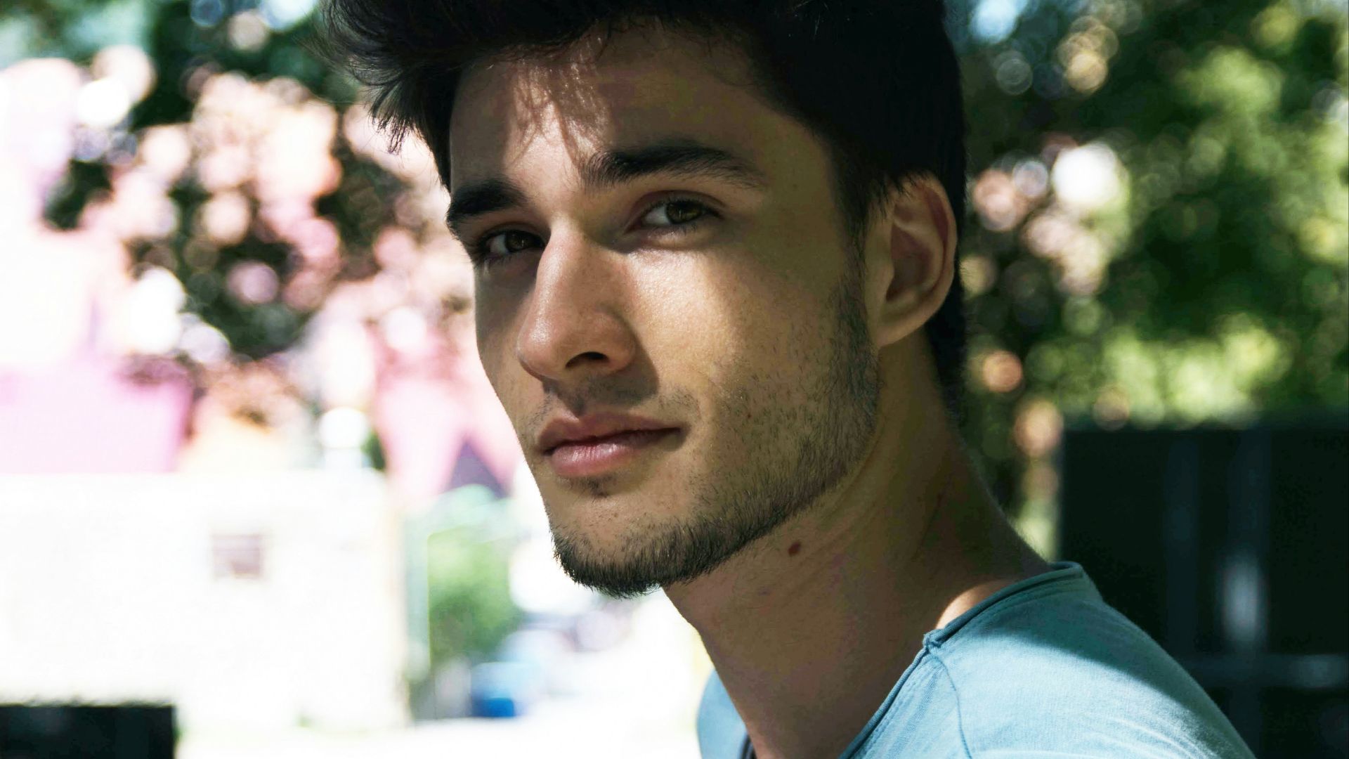 man standing near to tree