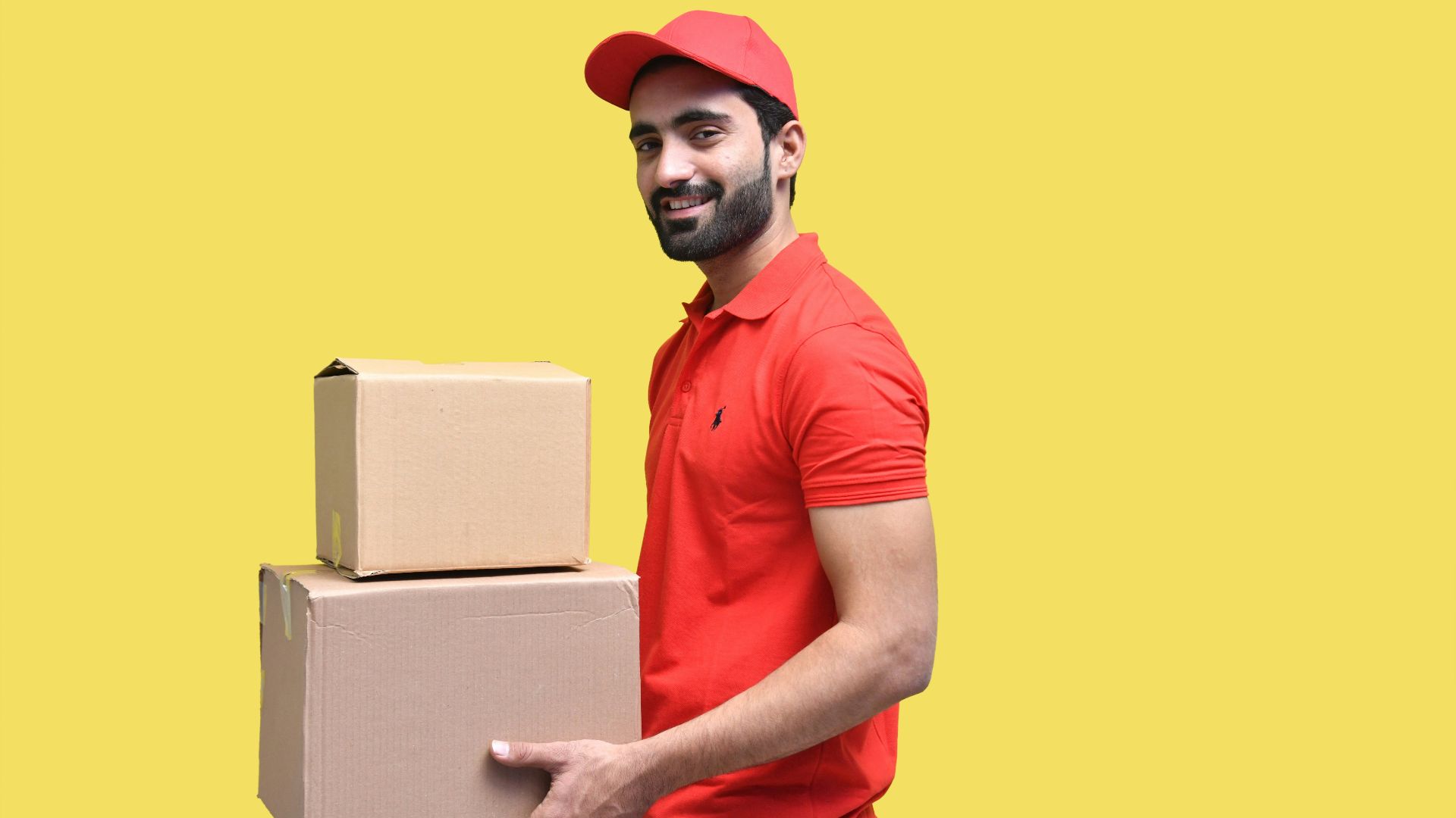 a man wearing a red hat