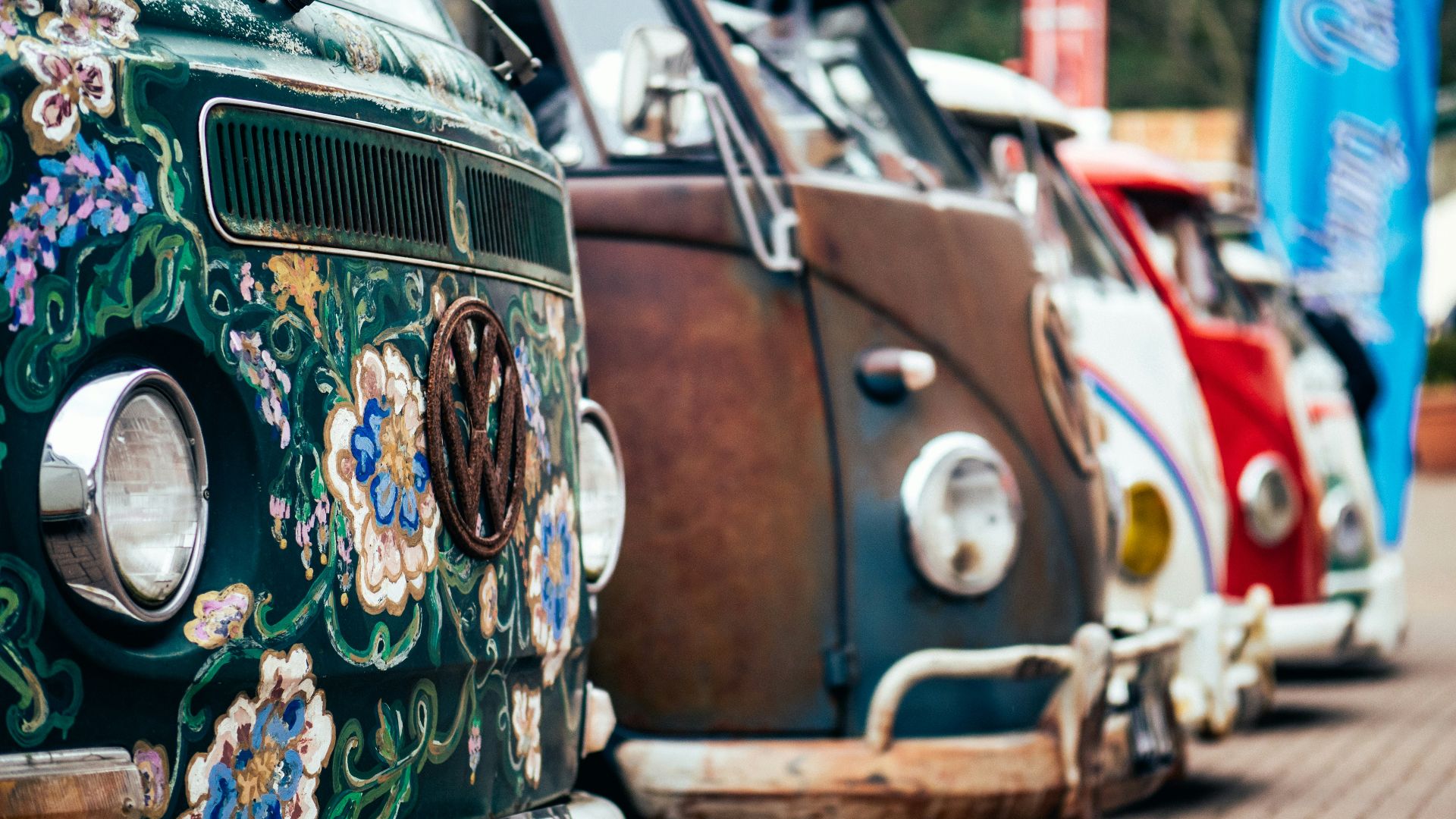 tilt shift lens photo of Volkswagen buses