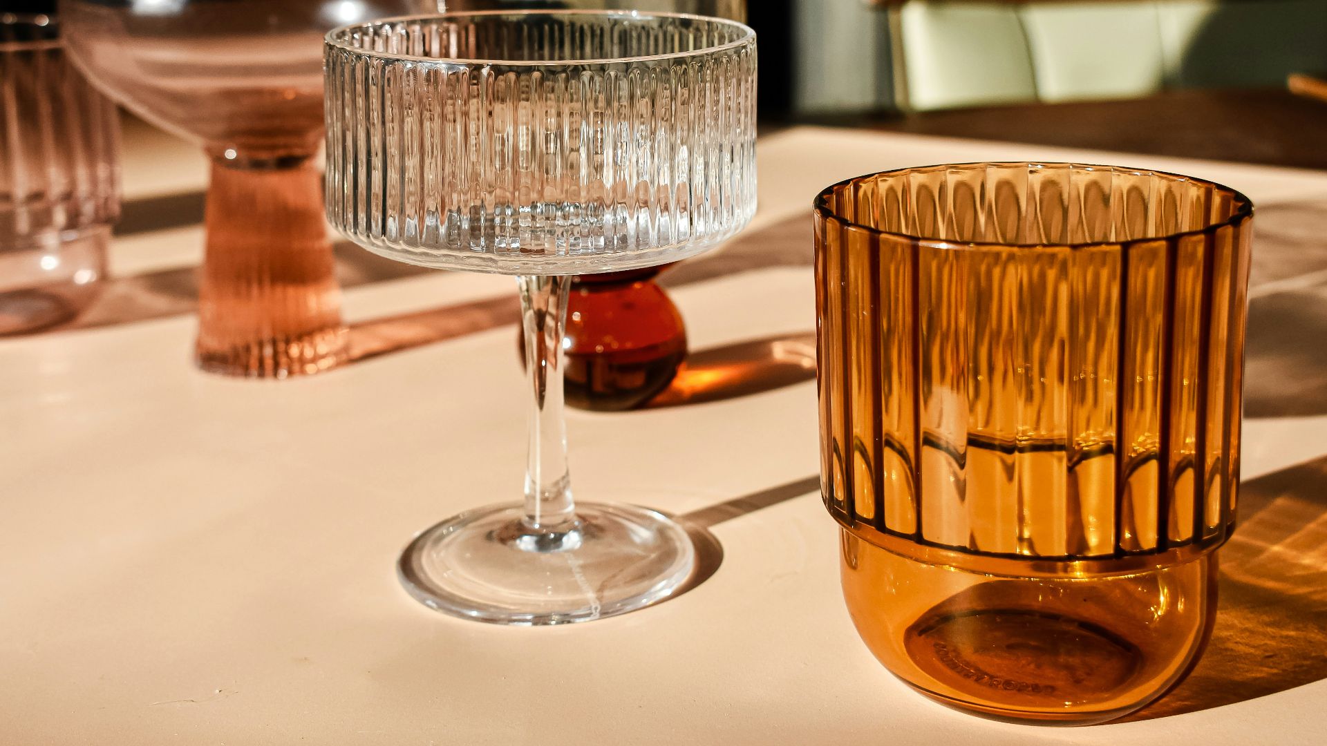 a close up of a glass on a table