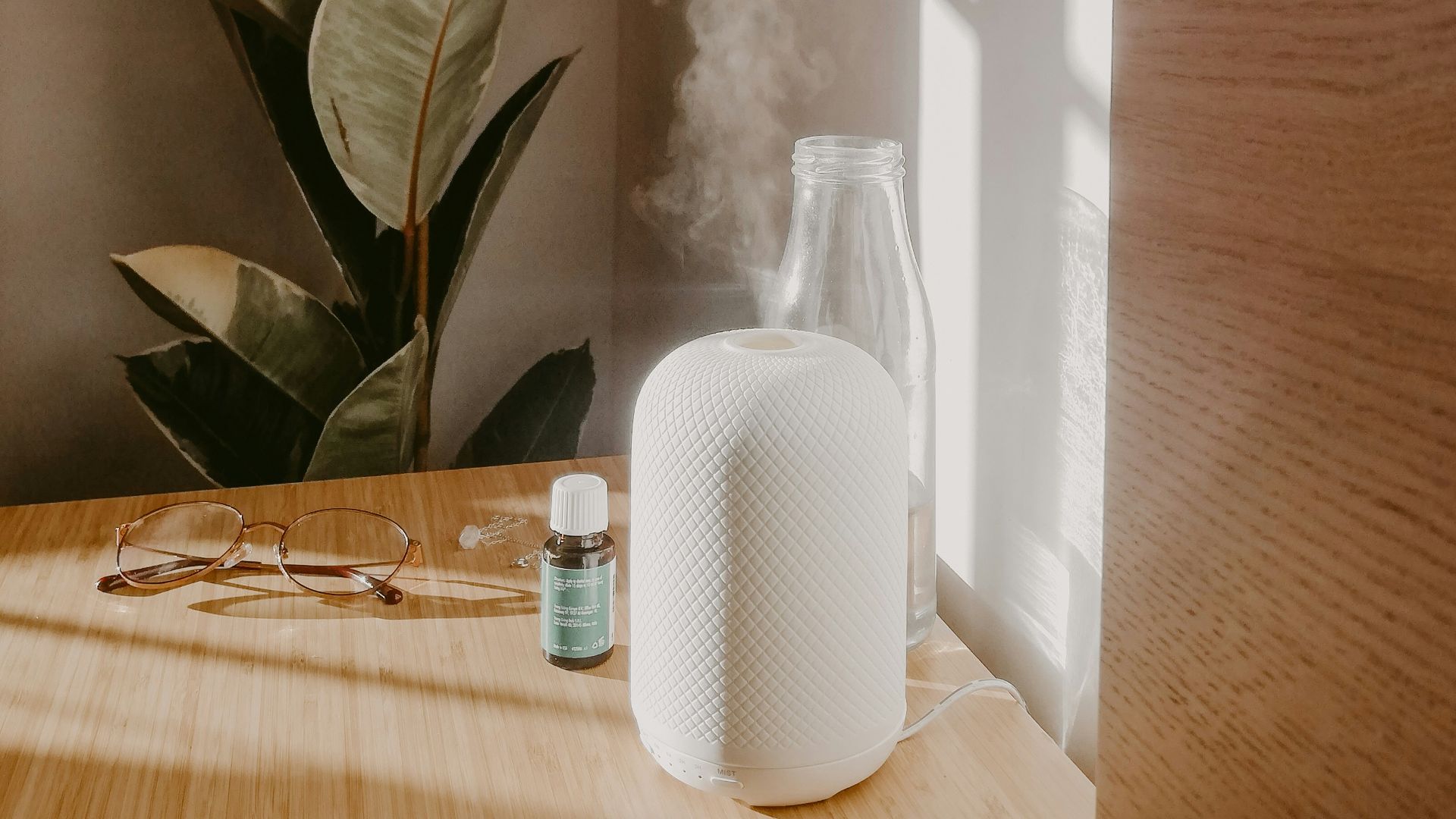 white flower on brown wooden table