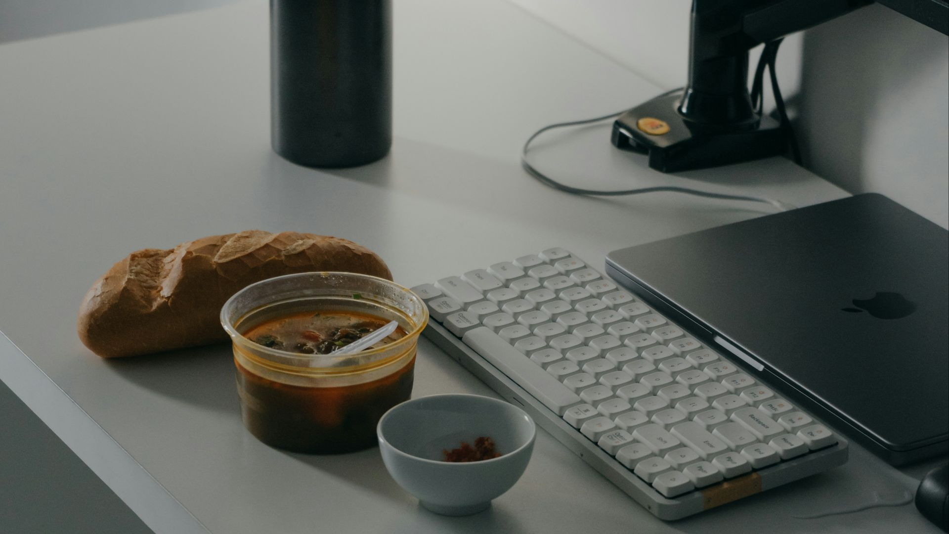 A desktop computer sitting on top of a white desk