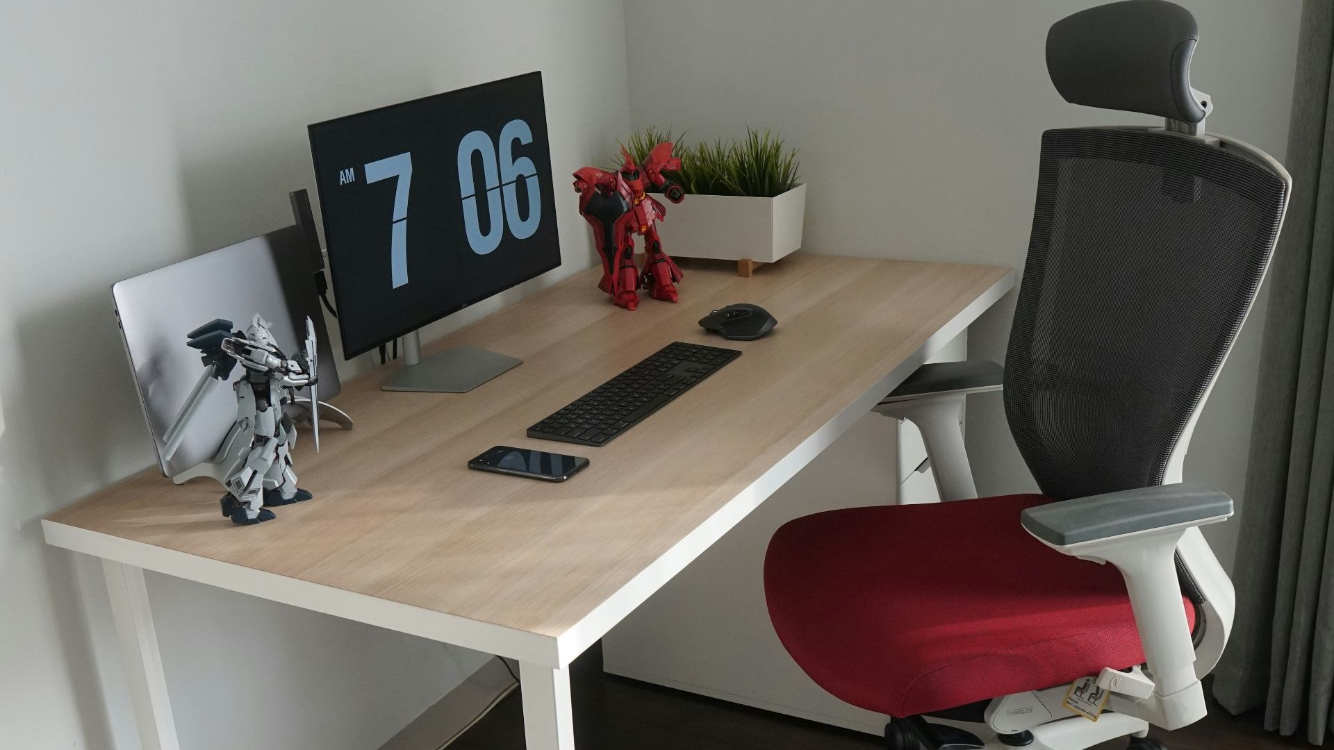 black flat screen tv on brown wooden table
