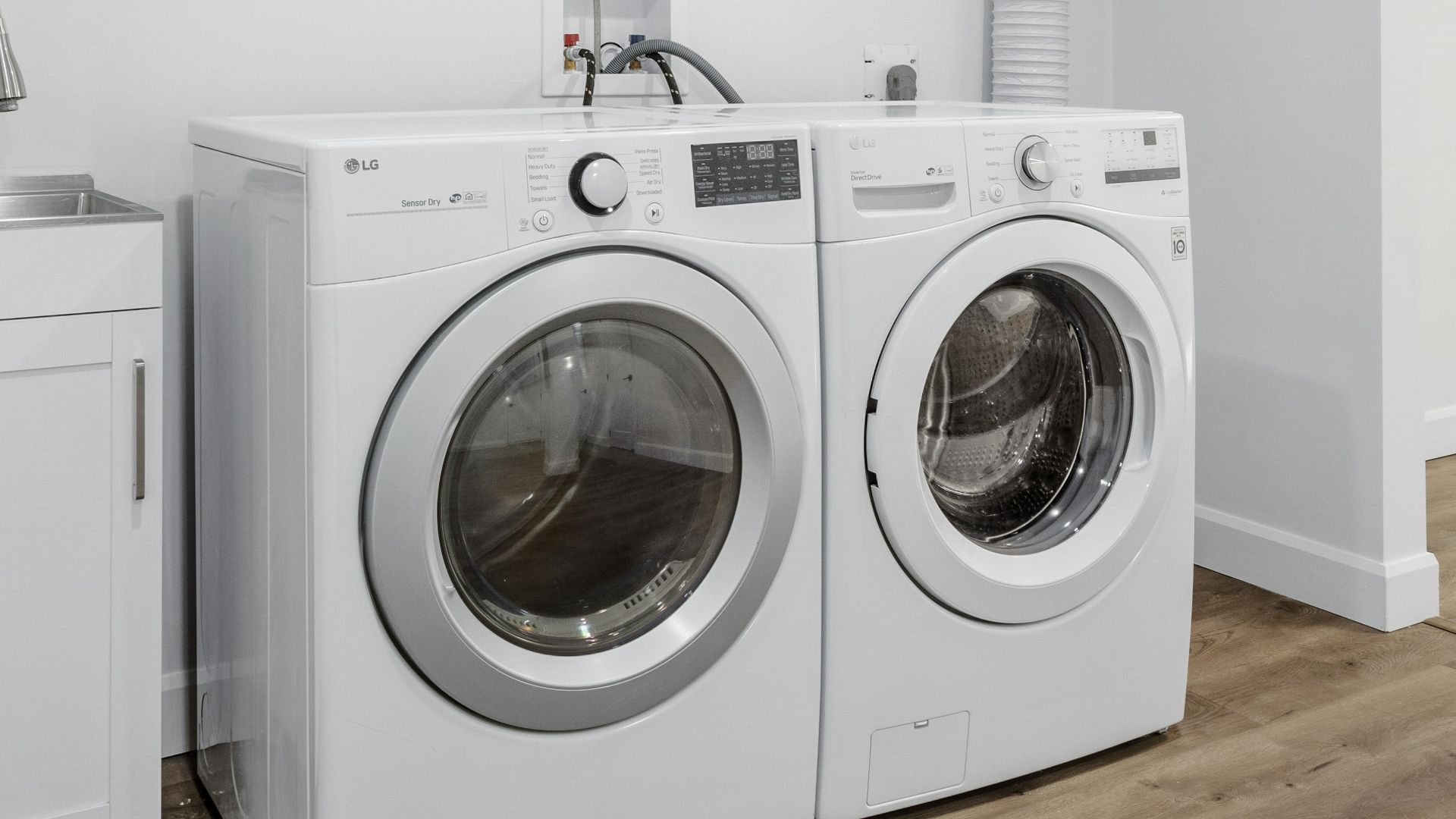 a laundry room with a washer and dryer
