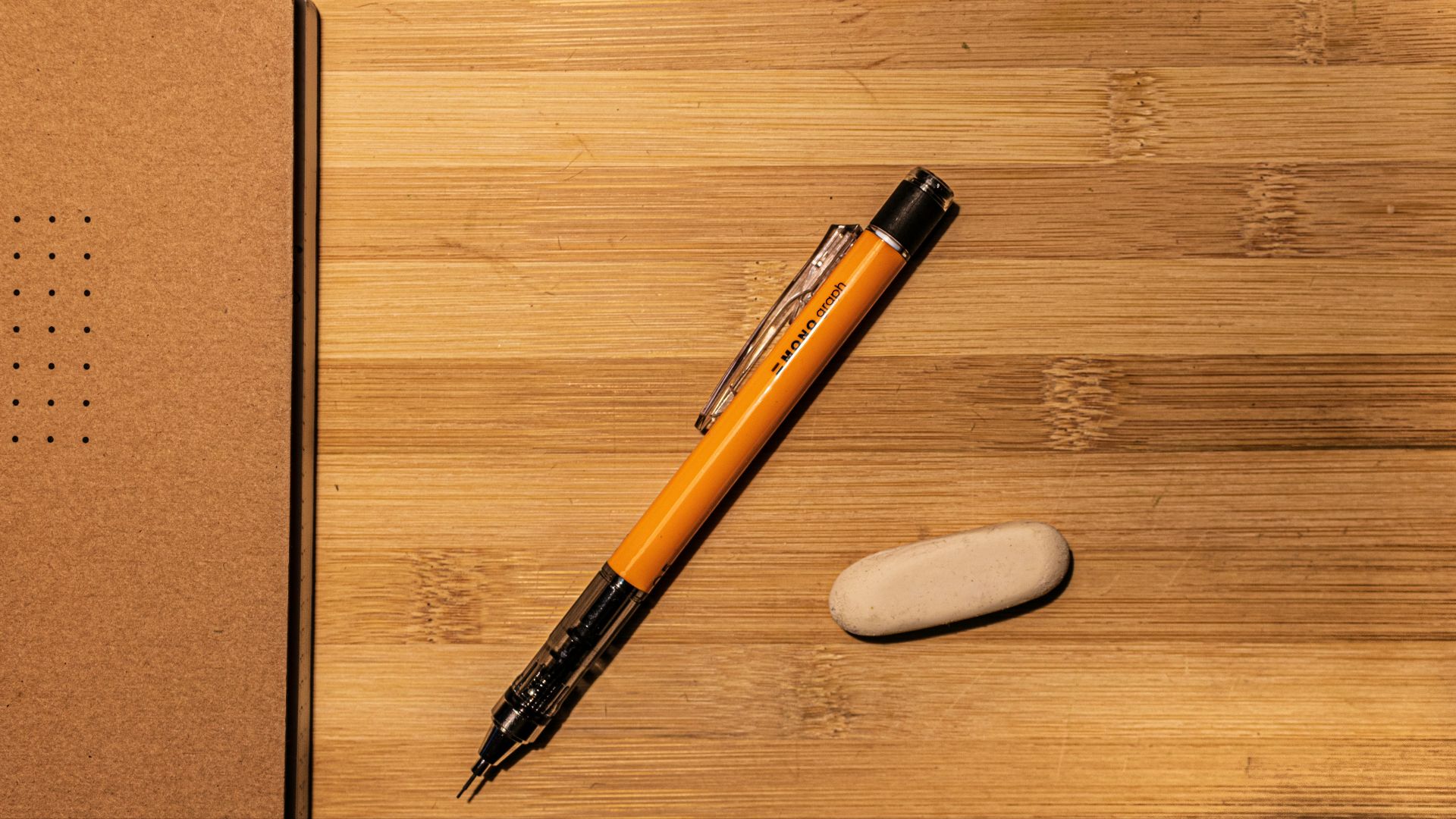 orange and black click pen