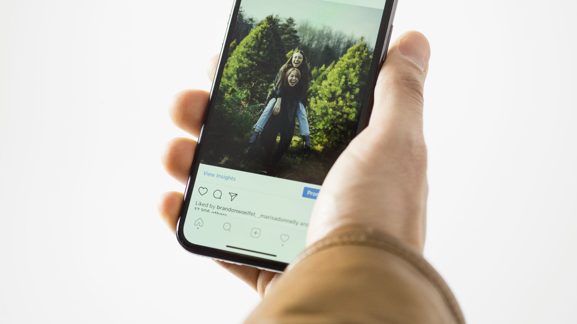 person using black smartphone