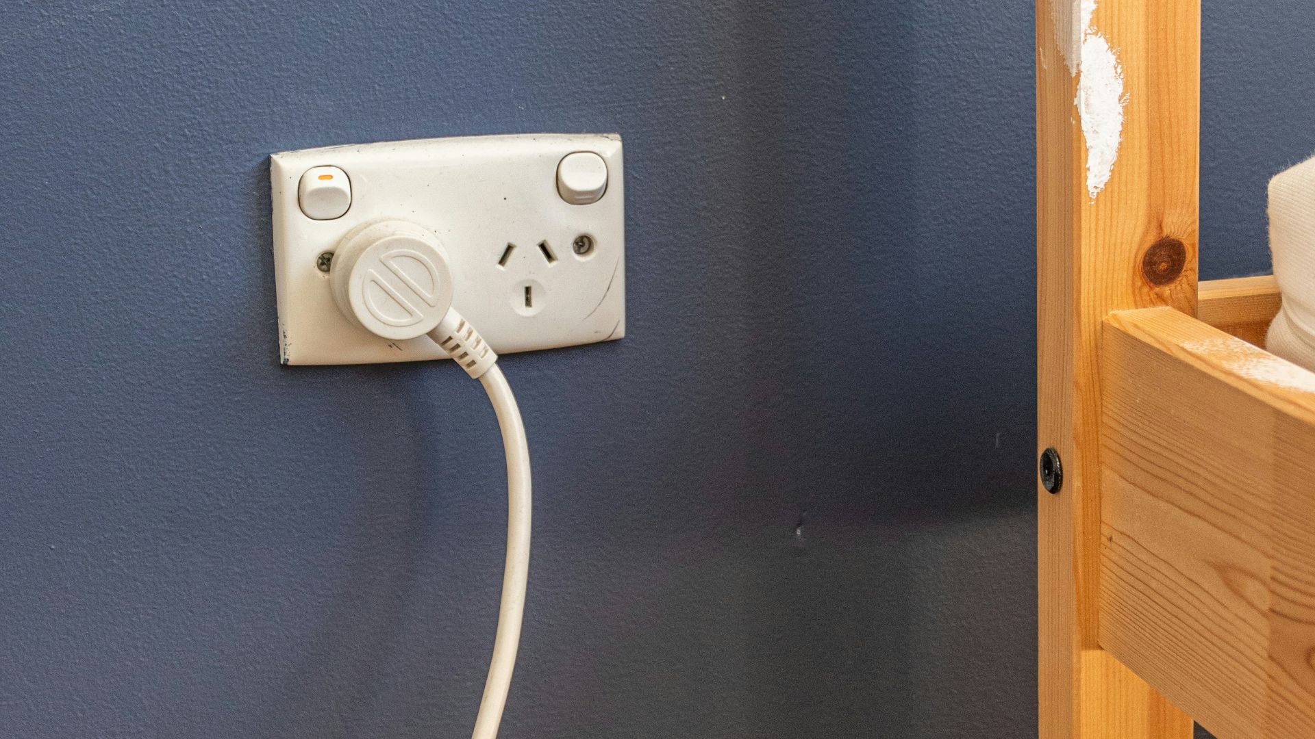 white electric plug on socket