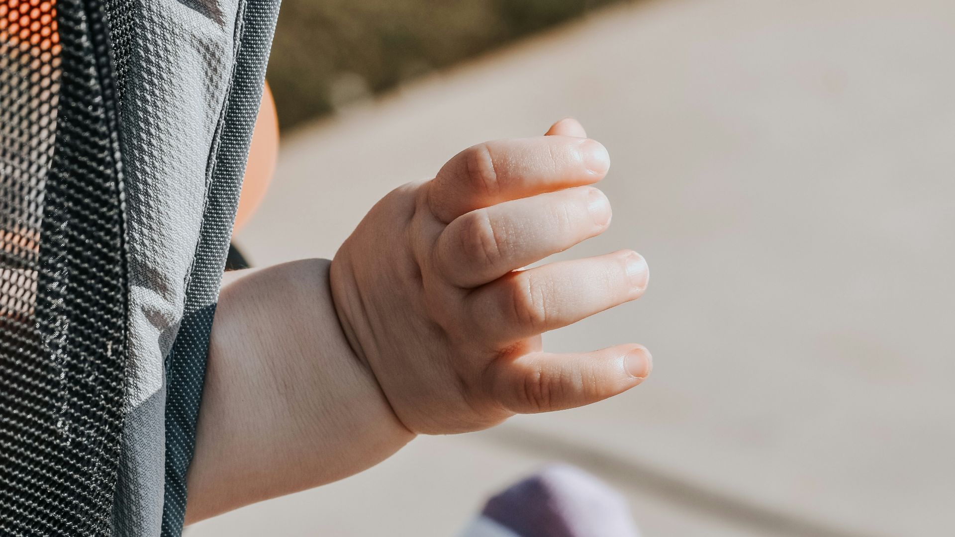 a child's arm with a cast on it