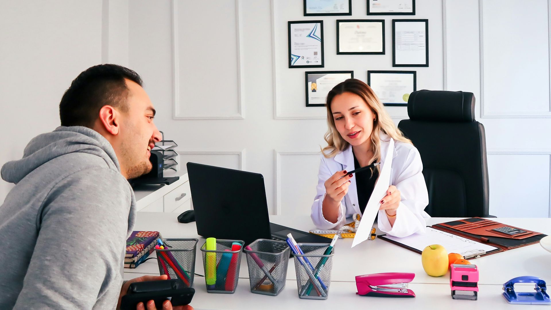 a man and a woman sitting at a table