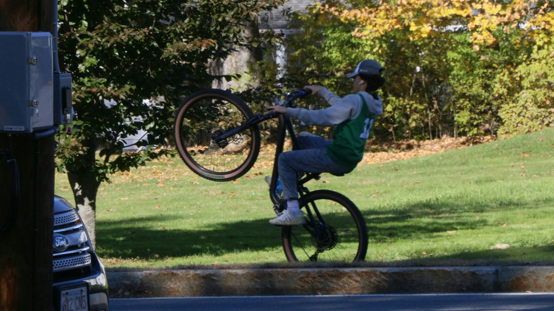 a person jumping a bike in the air