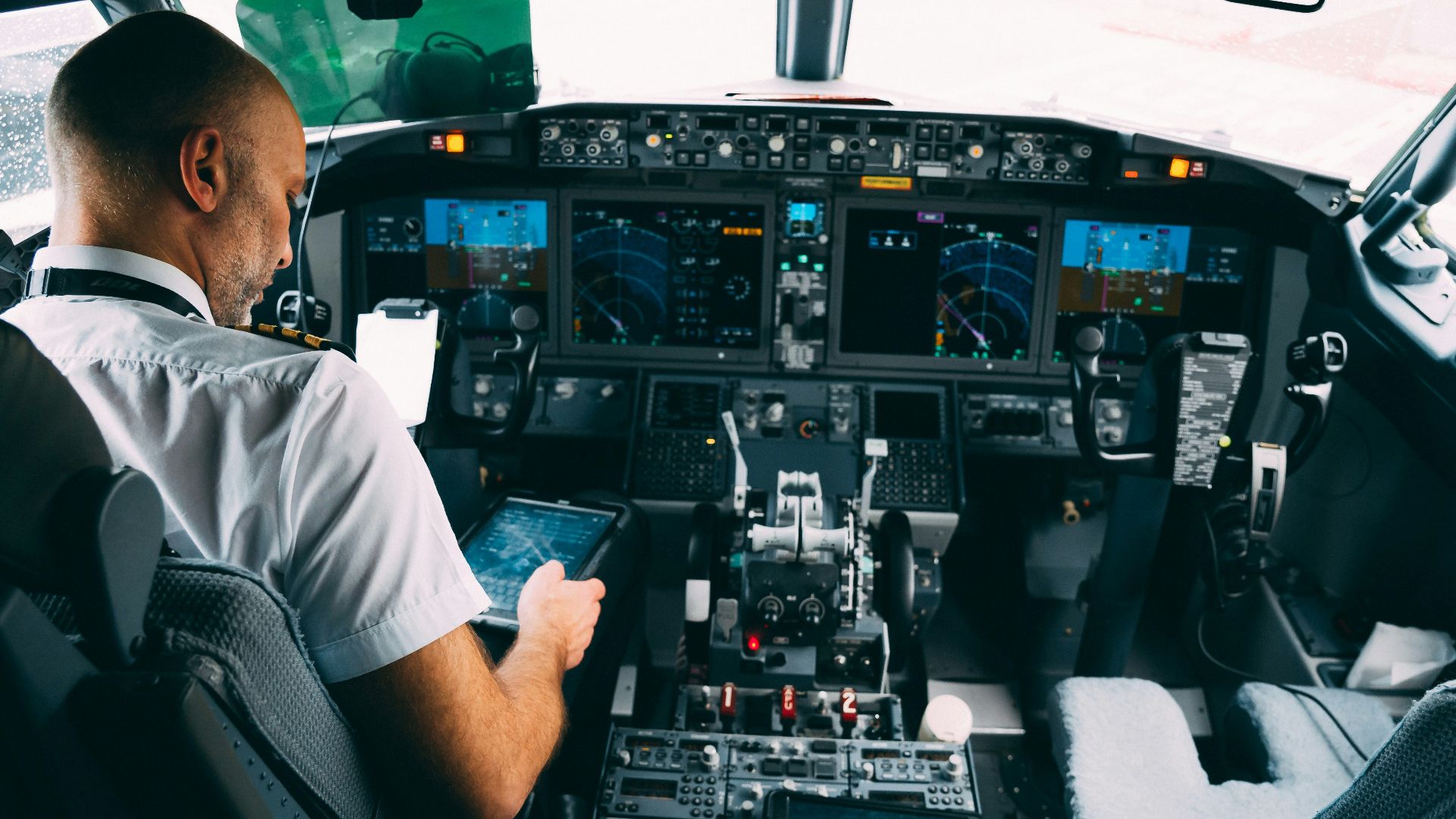 a man in a cockpit
