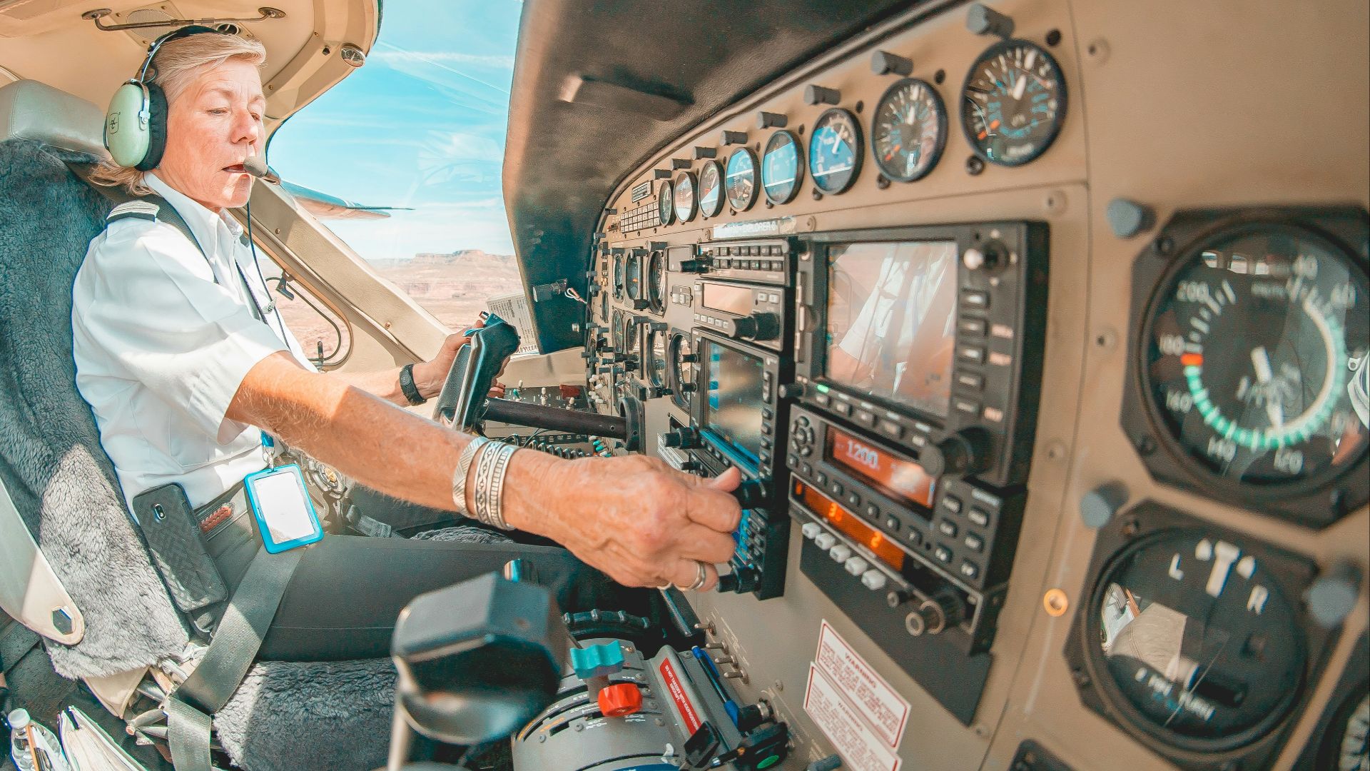 person in black jacket driving car during daytime