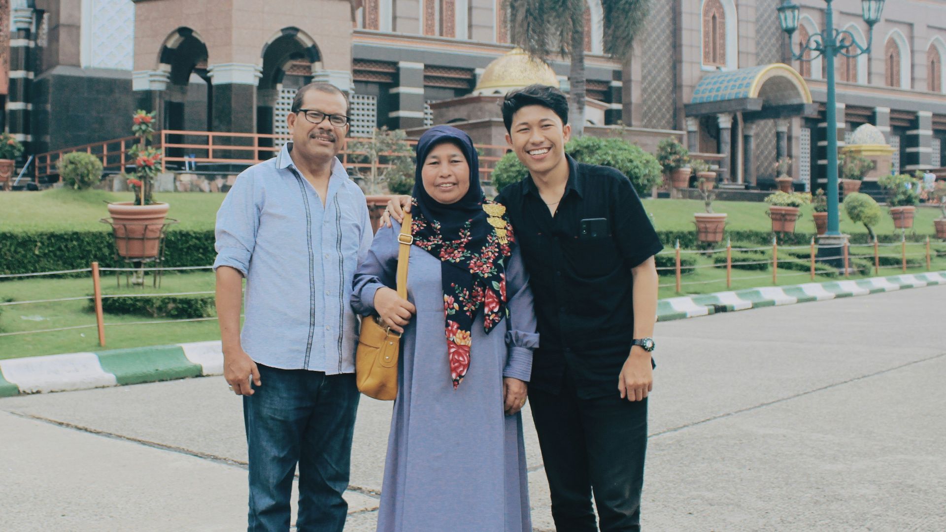 man in white dress shirt beside woman in black dress