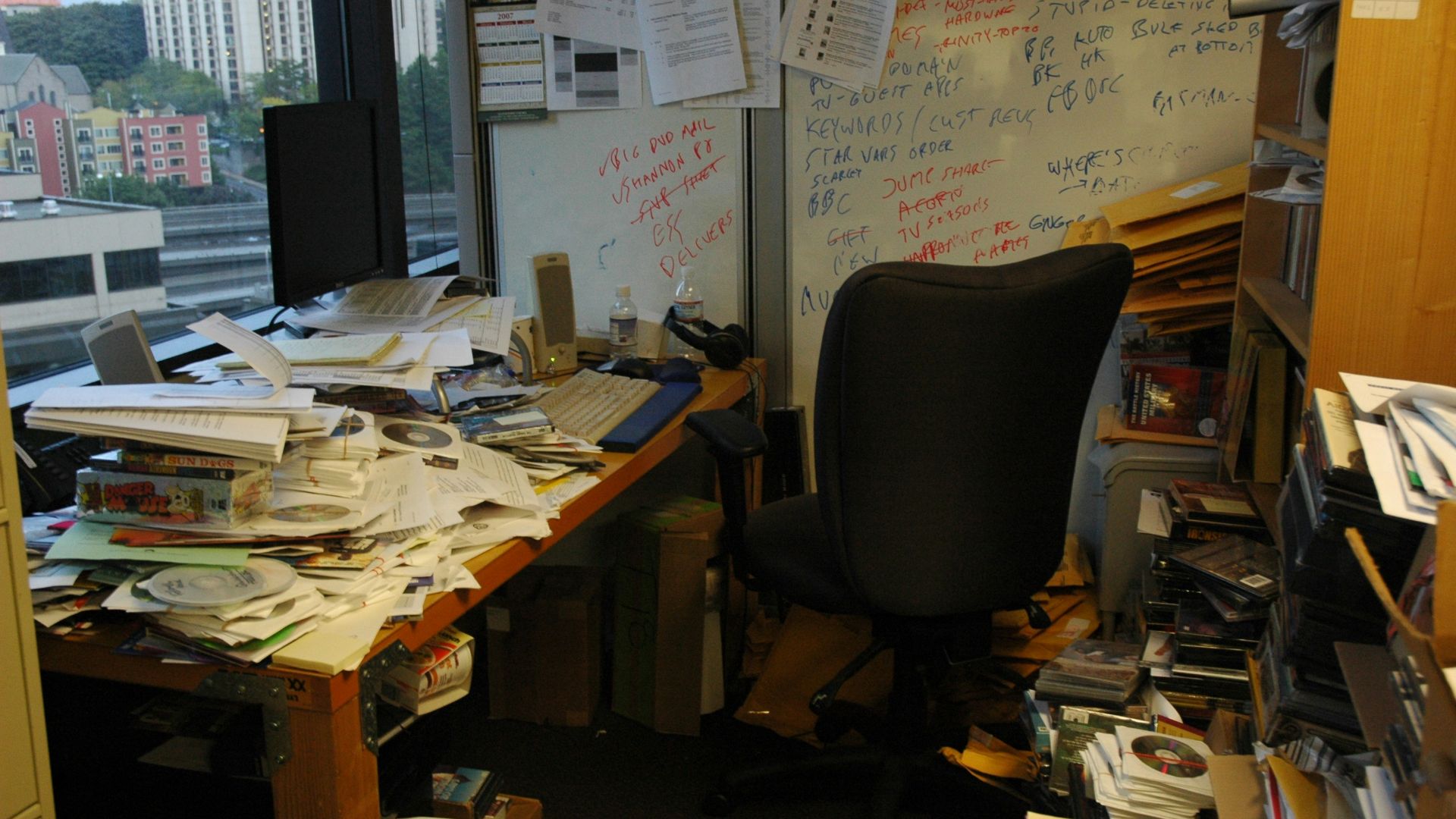 office table with pile of papers