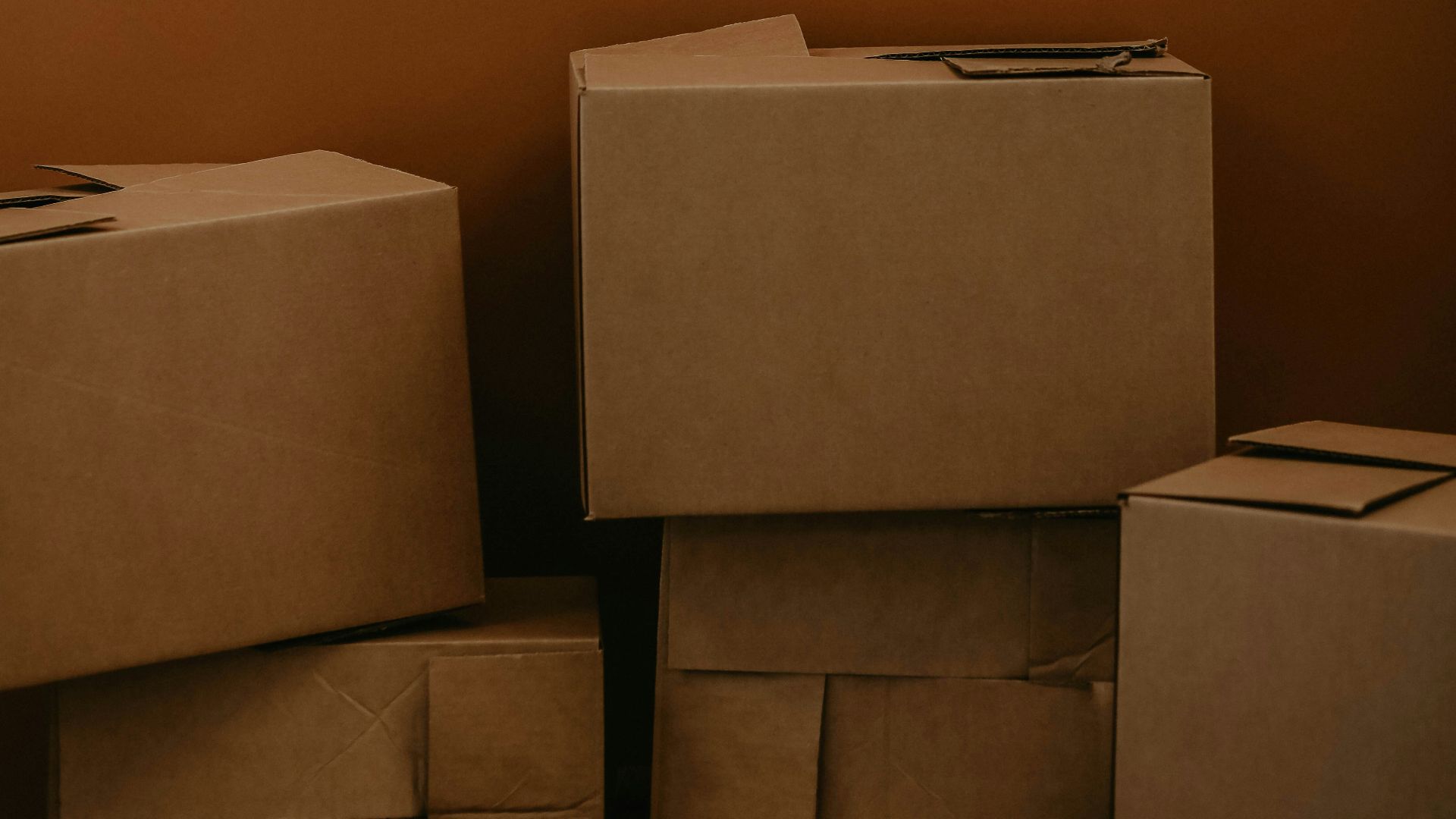 white cardboard box on brown wooden table
