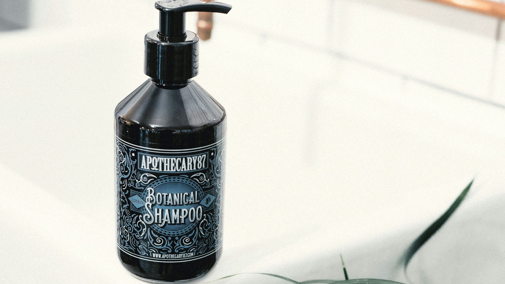 black and white plastic pump bottle