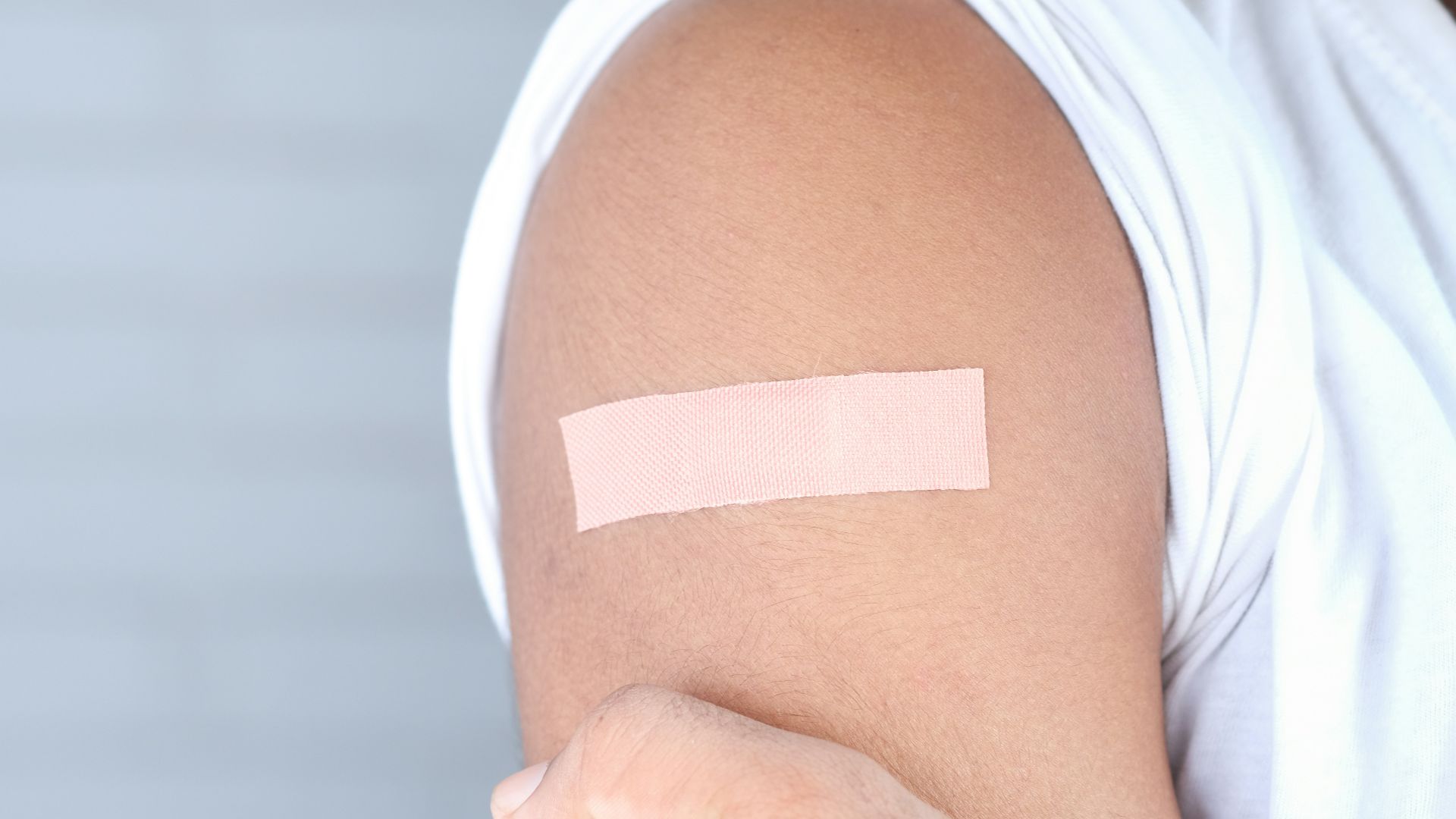 man in white tank top
