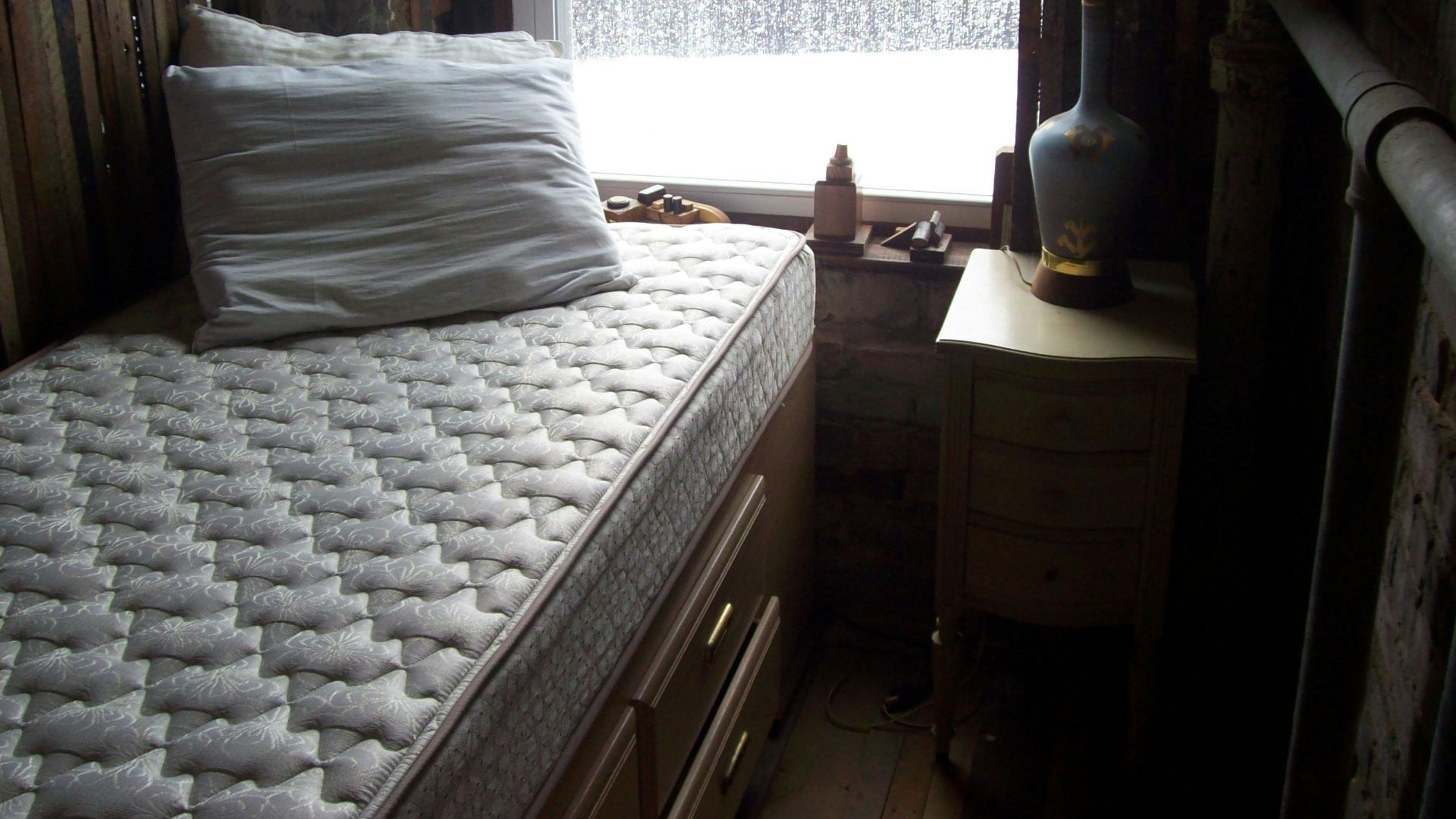 white and black bed linen