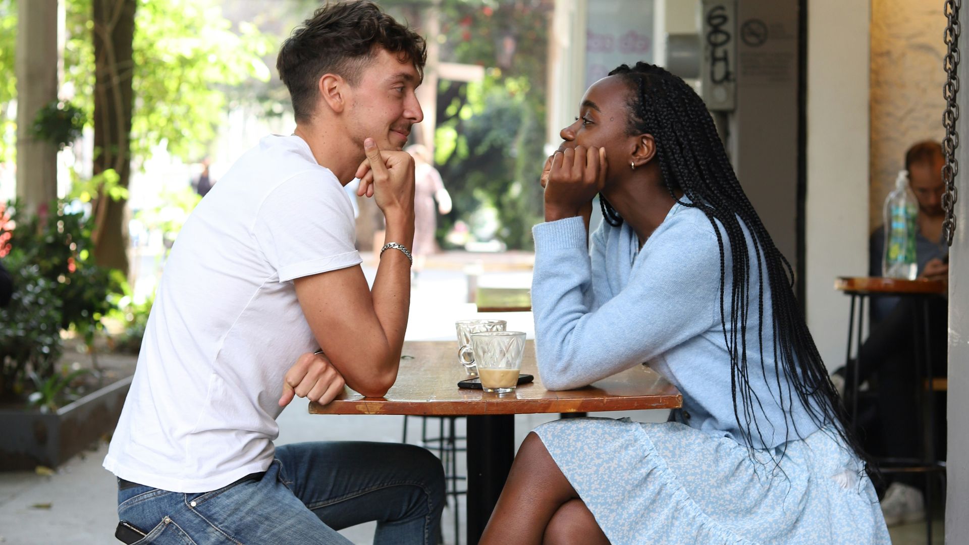 a man and a woman sitting at a table