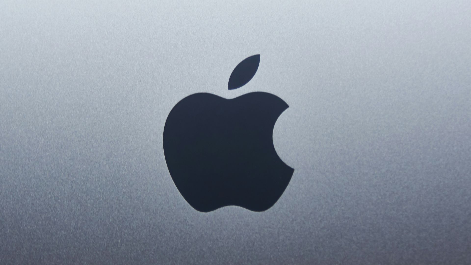 apple logo on blue surface