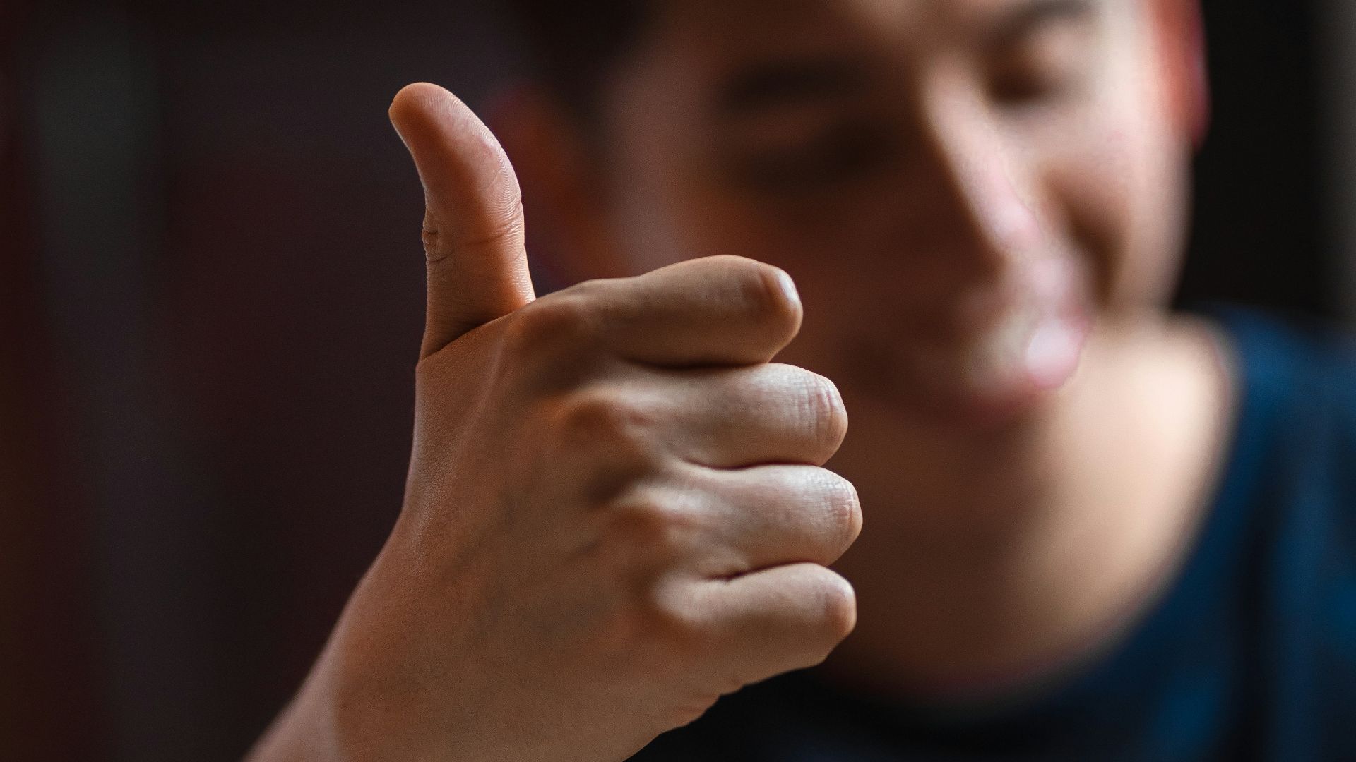 man wearing blue crew-neck shirt