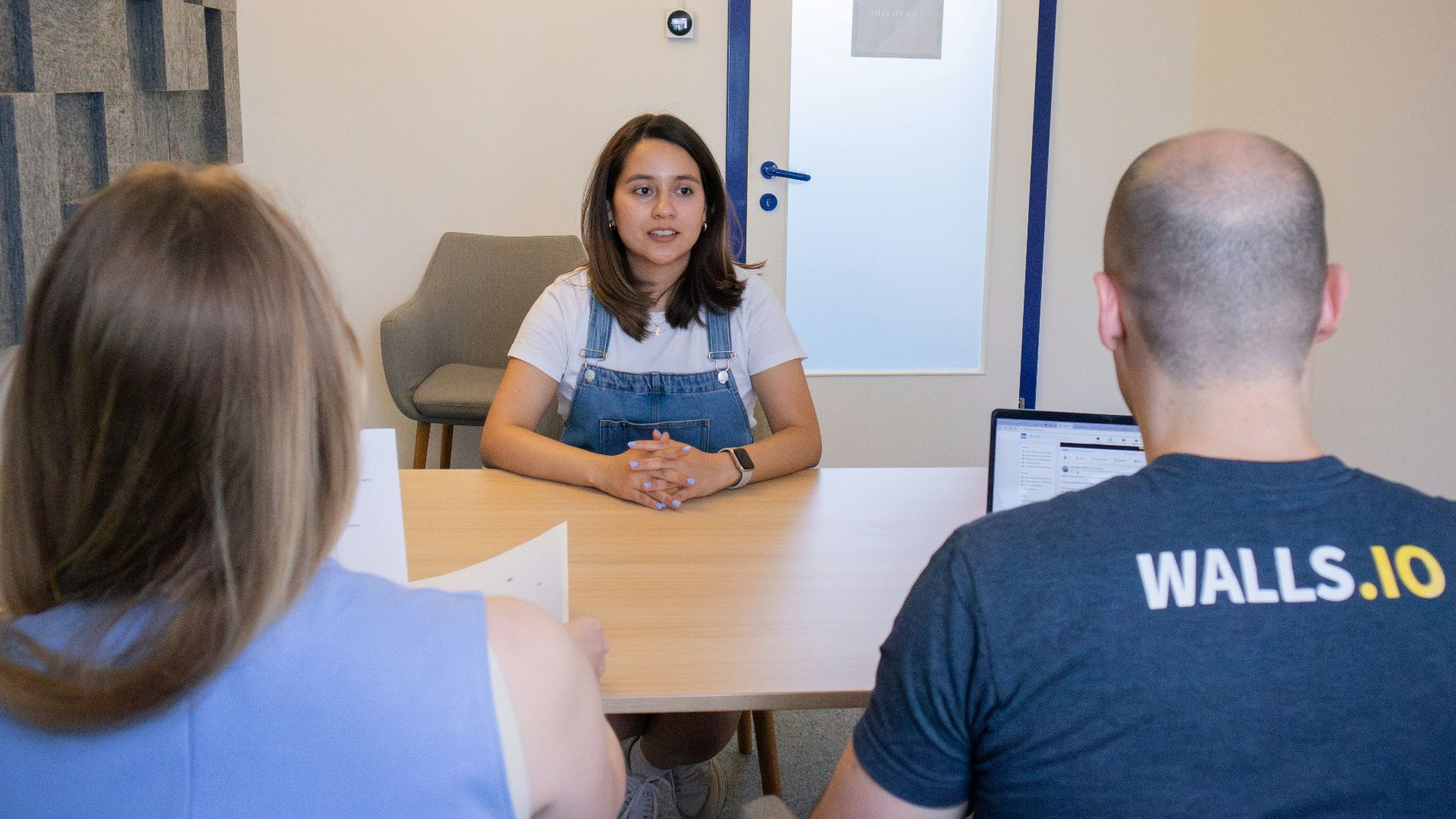 a group of people sitting around a table