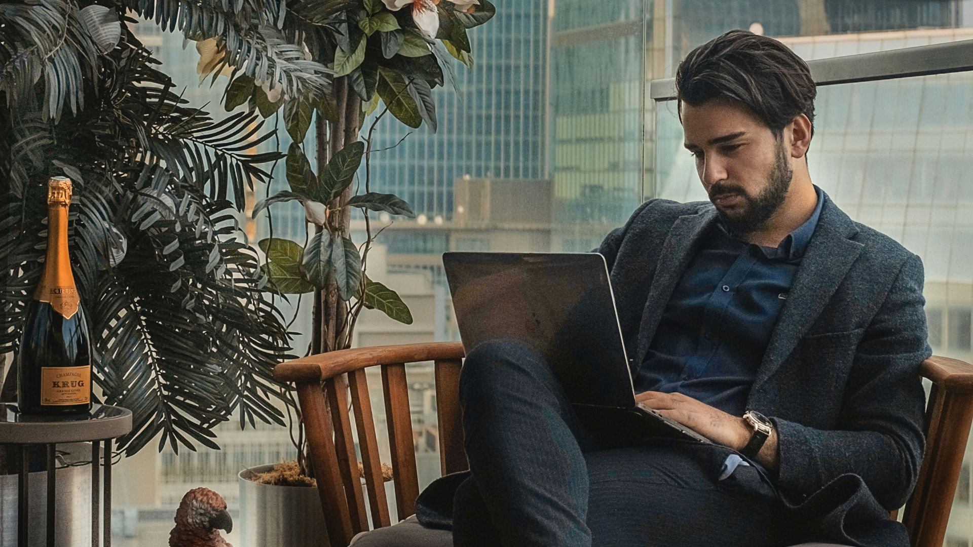 man sitting beside side table