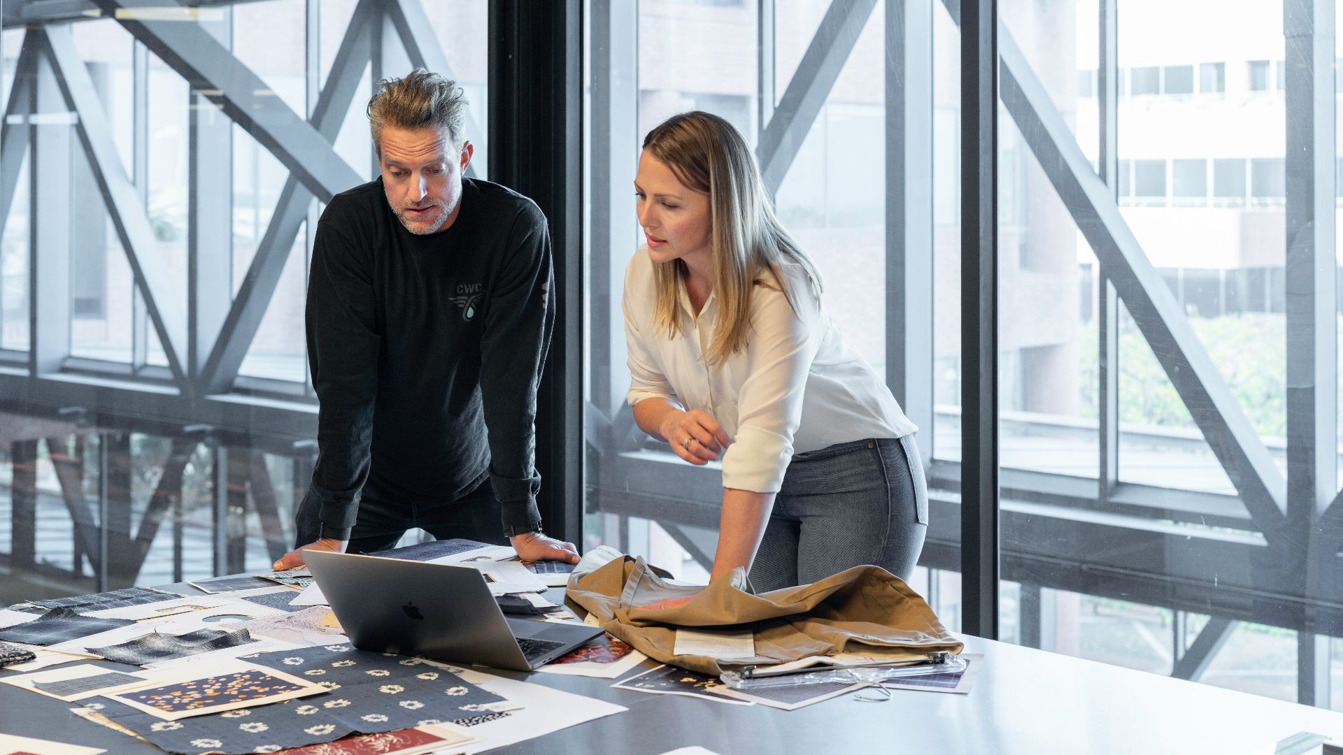 man and woman sitting at table