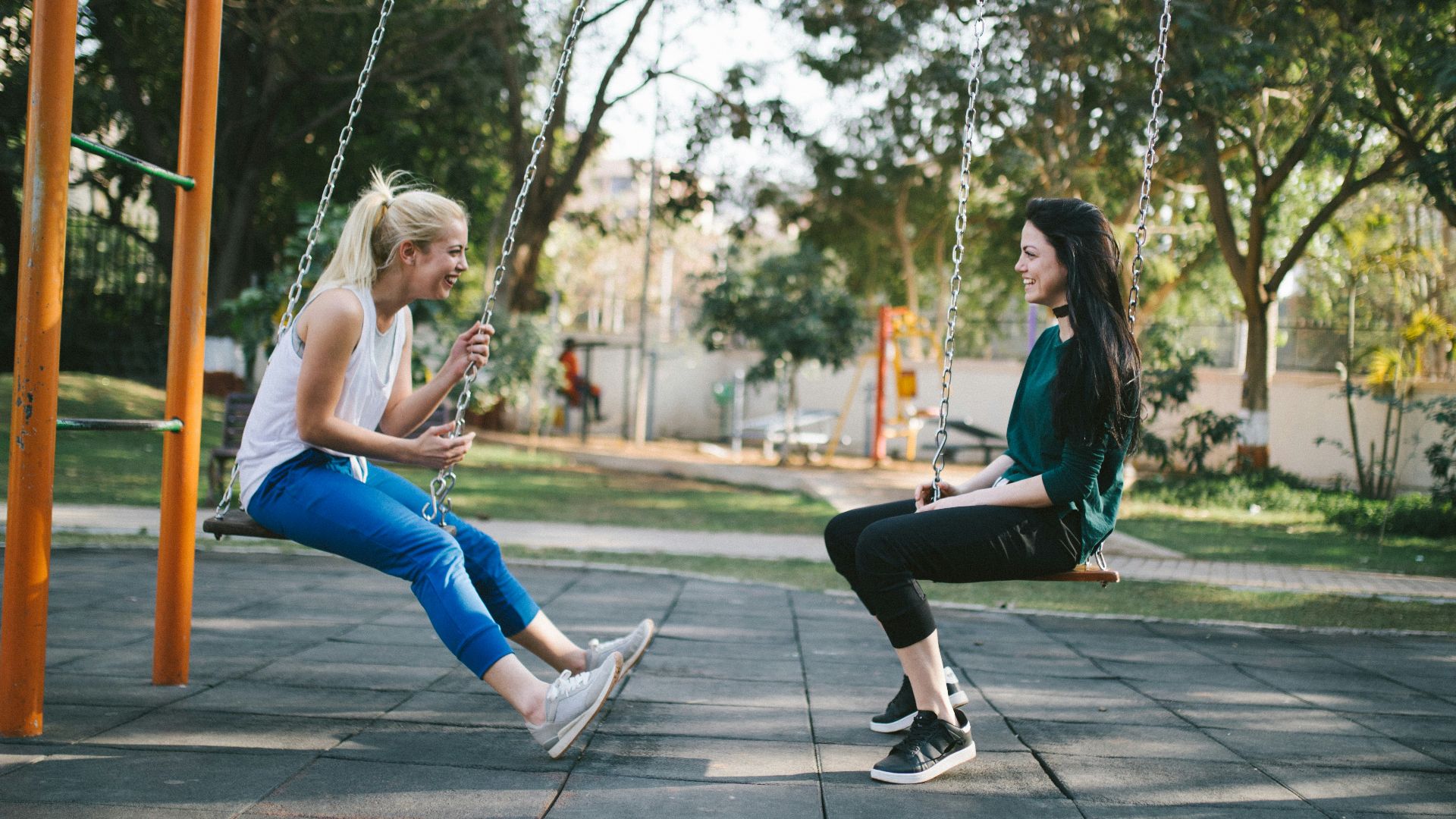 woman sitting on swing