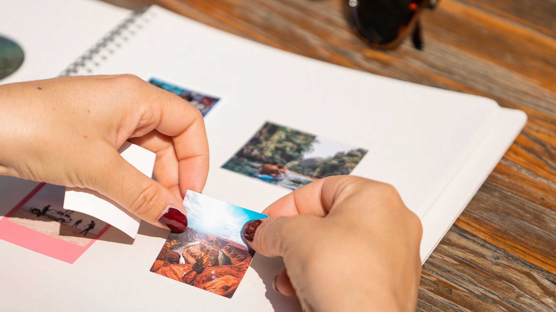 a person holding a toothbrush over a book