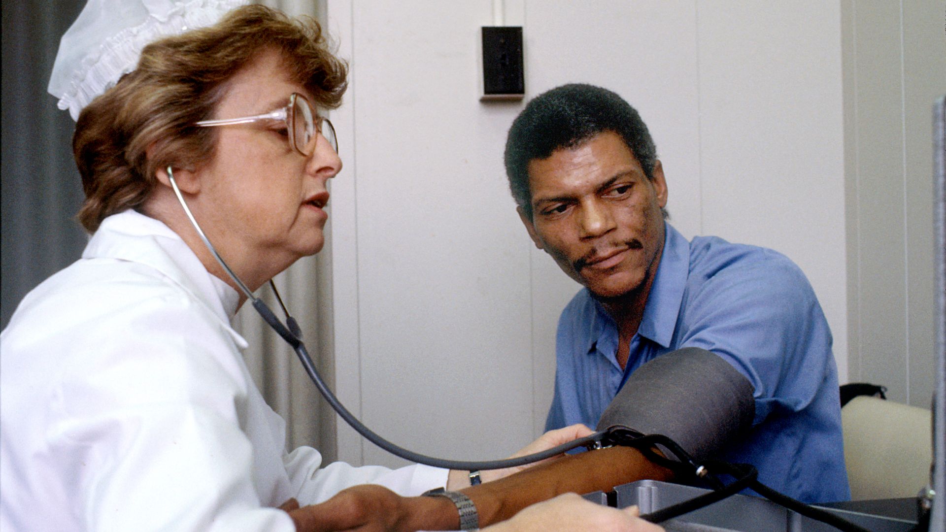 File:Nurse checks blood pressure.jpg