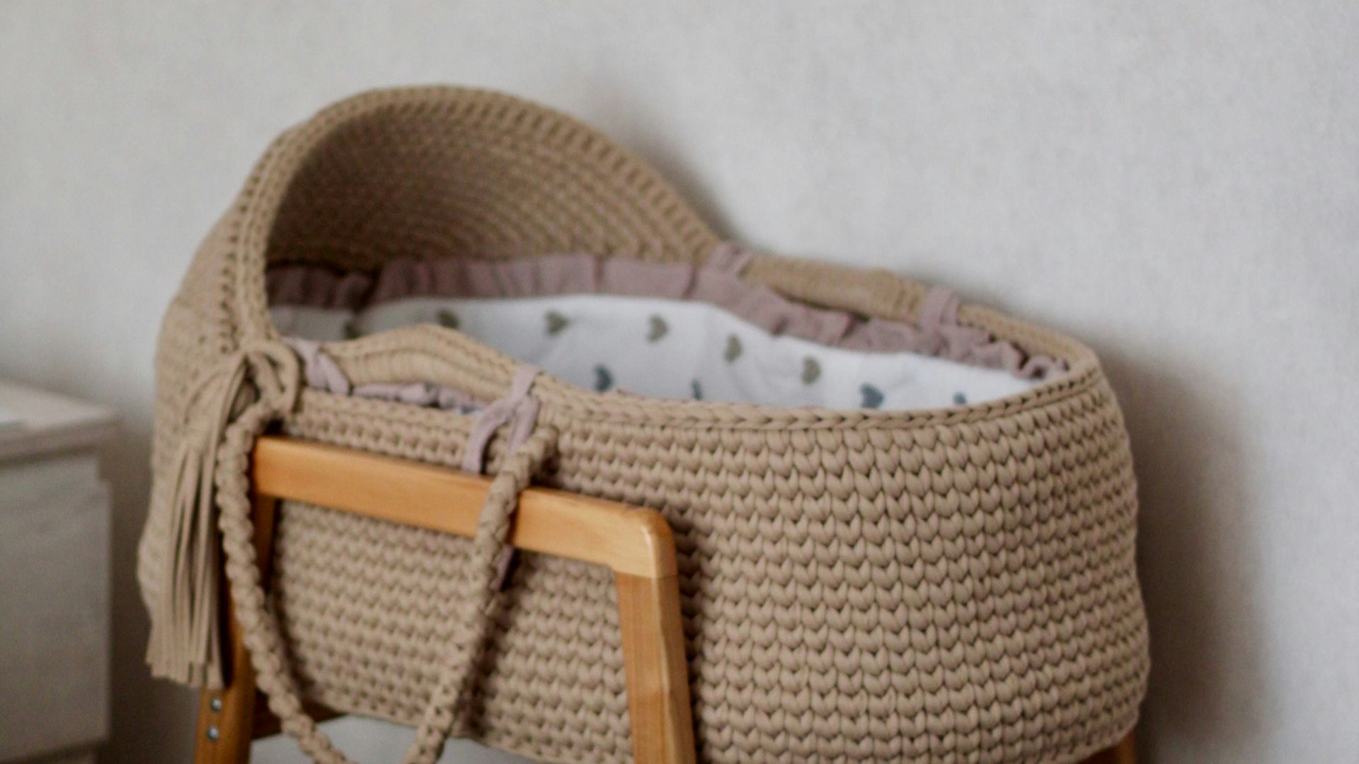 A bed with a basket on top of it