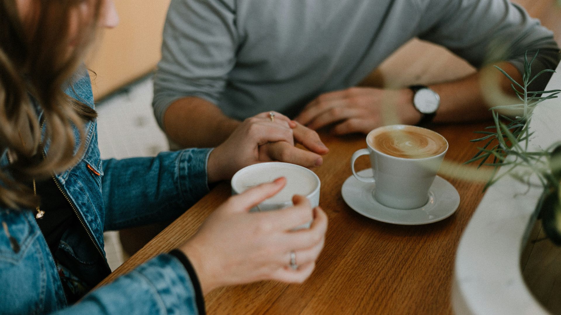 two mugs with coffee on table