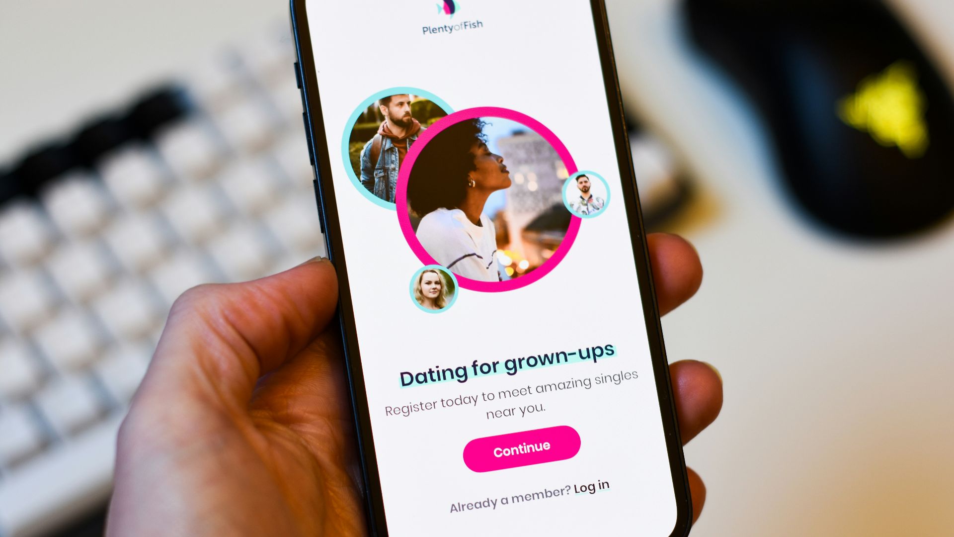 a person holding a cell phone in their hand