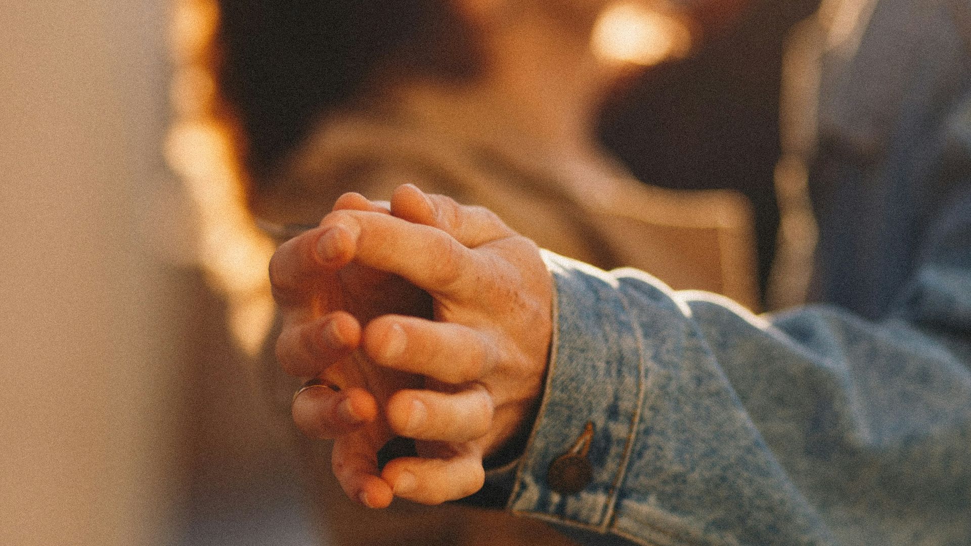 person in blue denim jacket