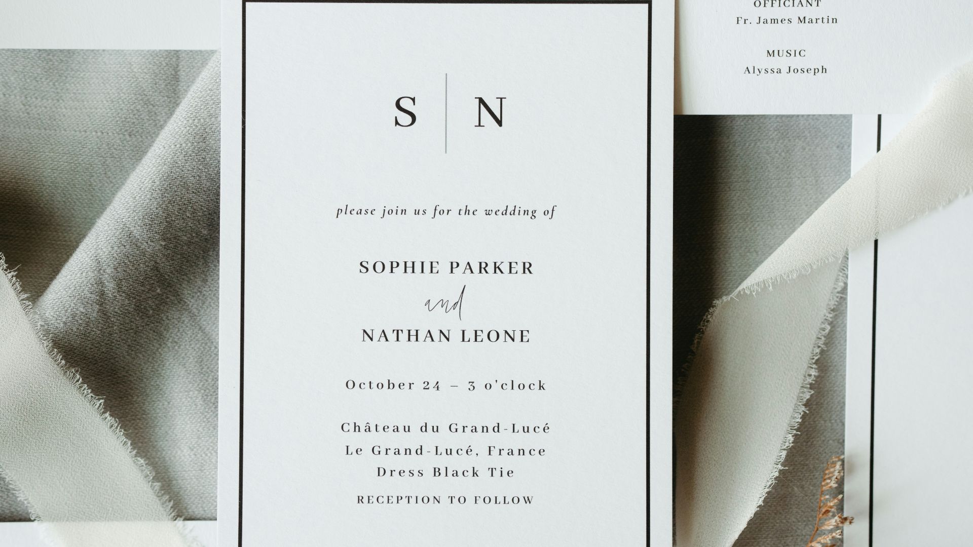 A close up of a wedding stationery on a table