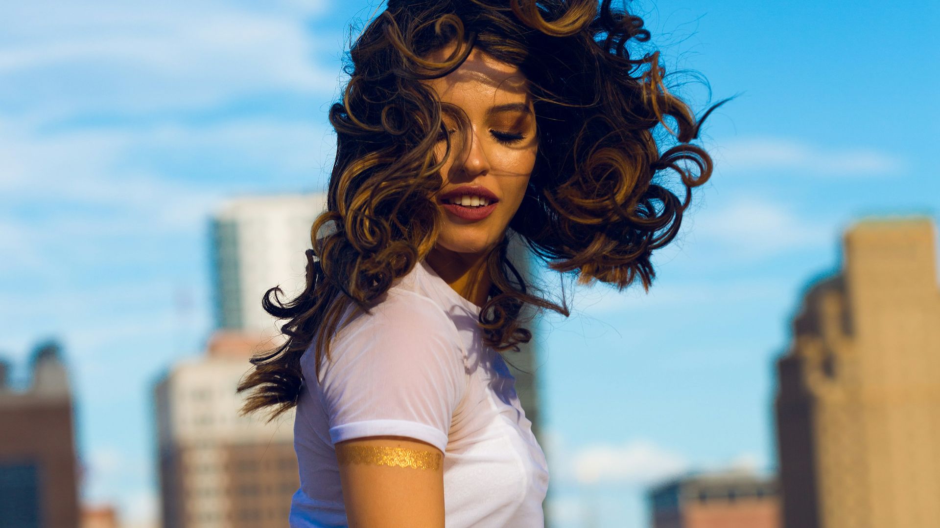 woman wearing white shirt standing