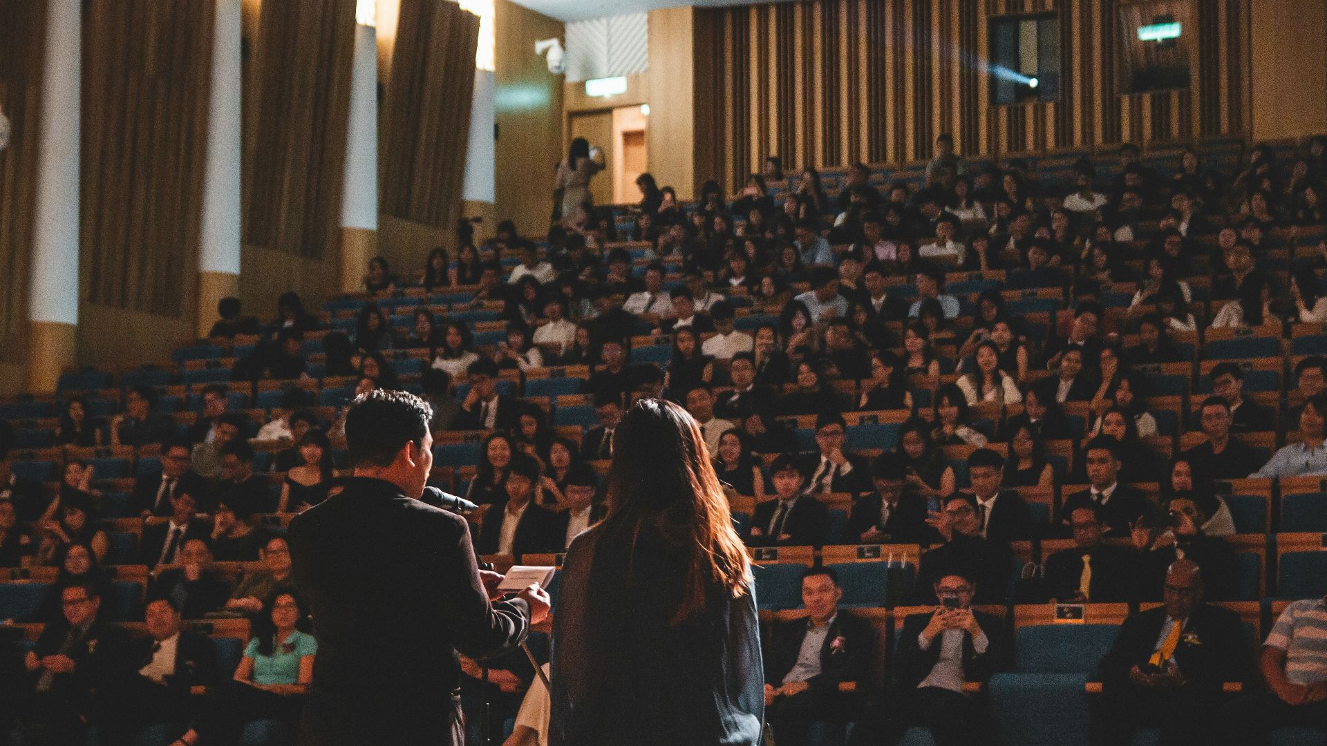 people sitting on chair inside room