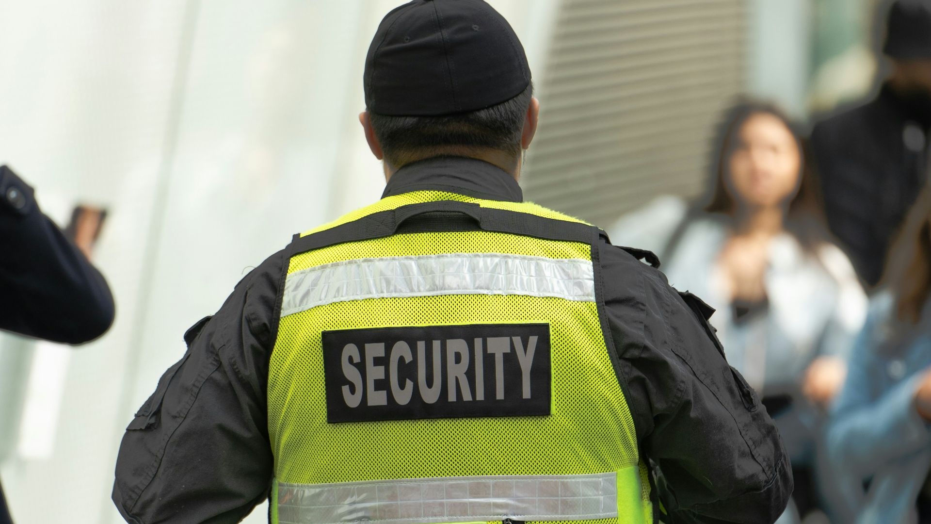 a security officer walking down a street